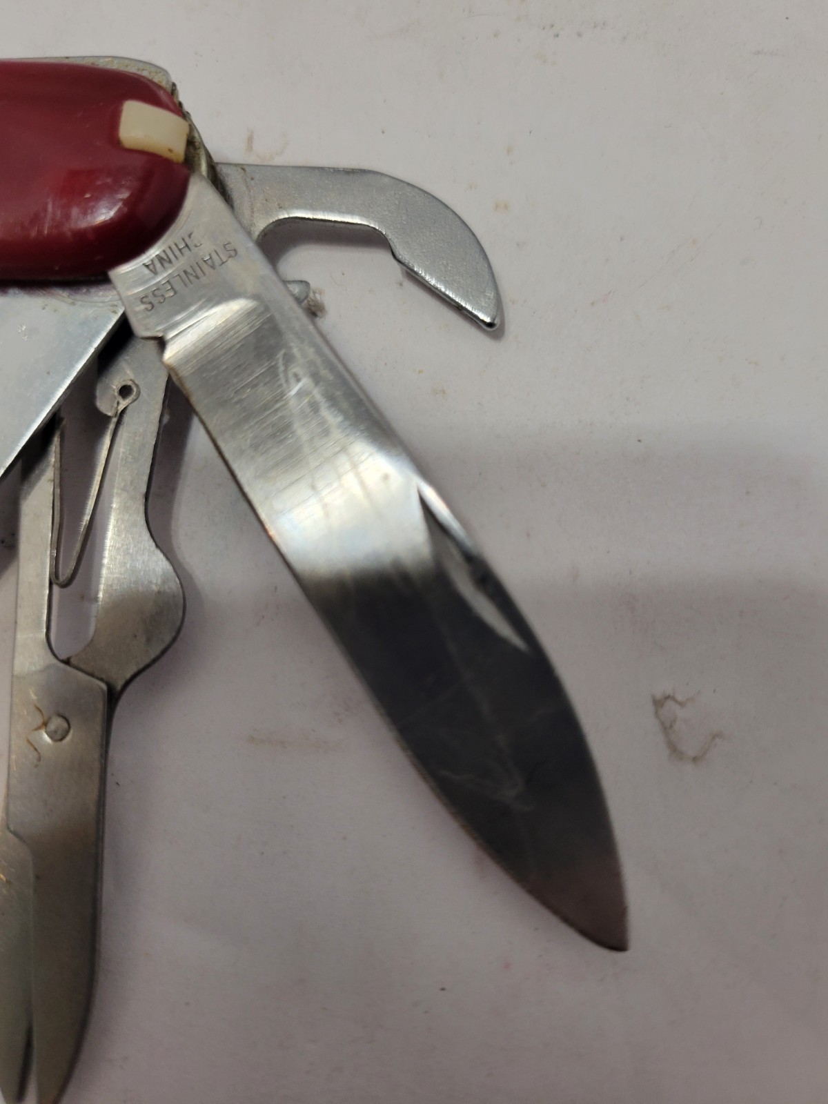 Red Multi-Tool Knife with Scissors, Serrated Knife, Corkscrew, Bottle Opener