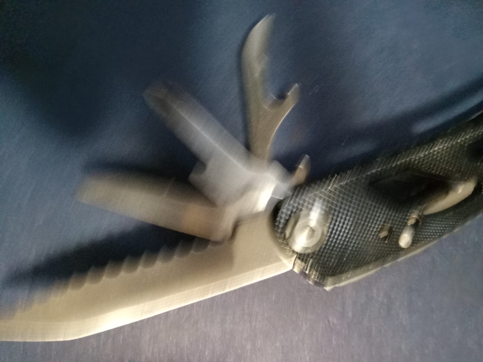 9 Multi-tool Black, no brand name with knife, plies, file, etc