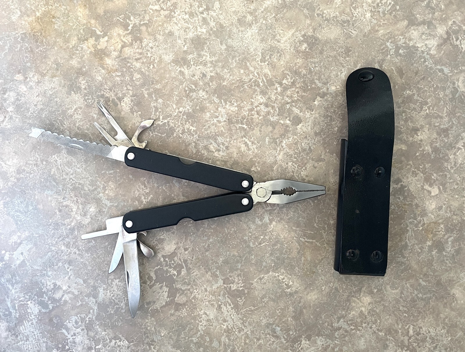 Multi-tool with belt sheath, 9 tool functions, New Without Box, Made in China