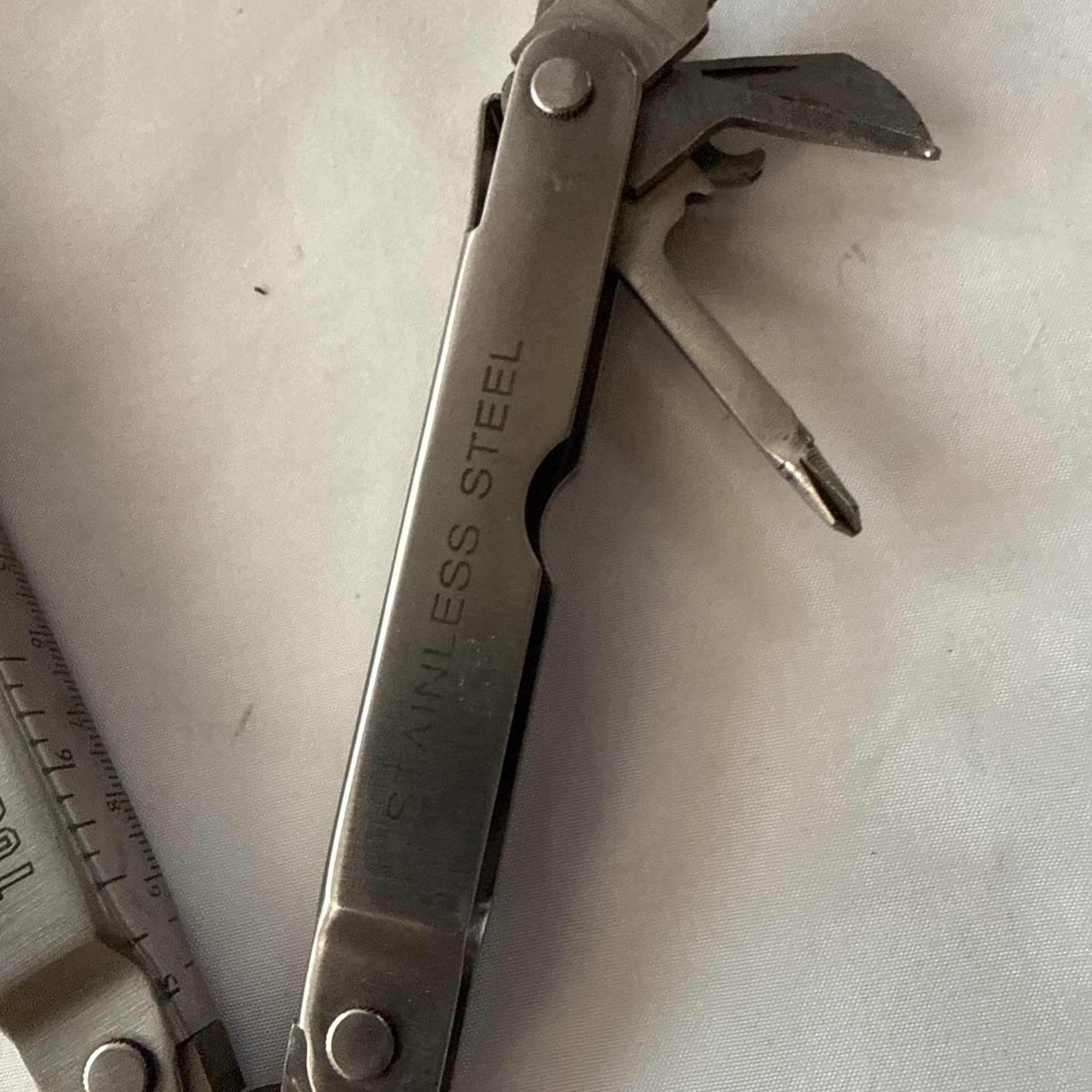 Tool Shop, multitool 13 tools plus!!! Nice tool!!! Not branded Stainless Steel