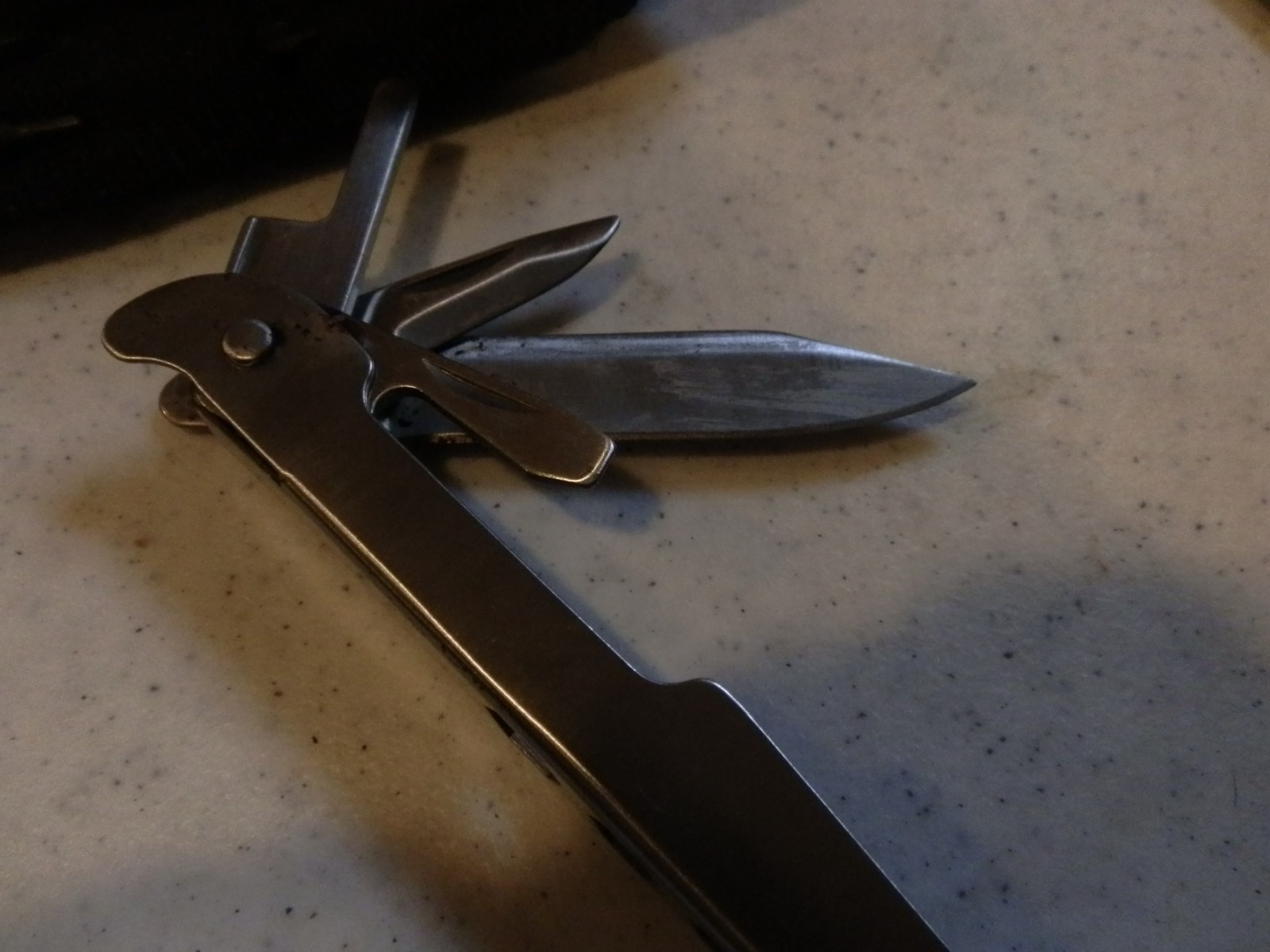Multitool. Unbranded. Nylon sheath. 8 auxilliary bits – see photos. EUC