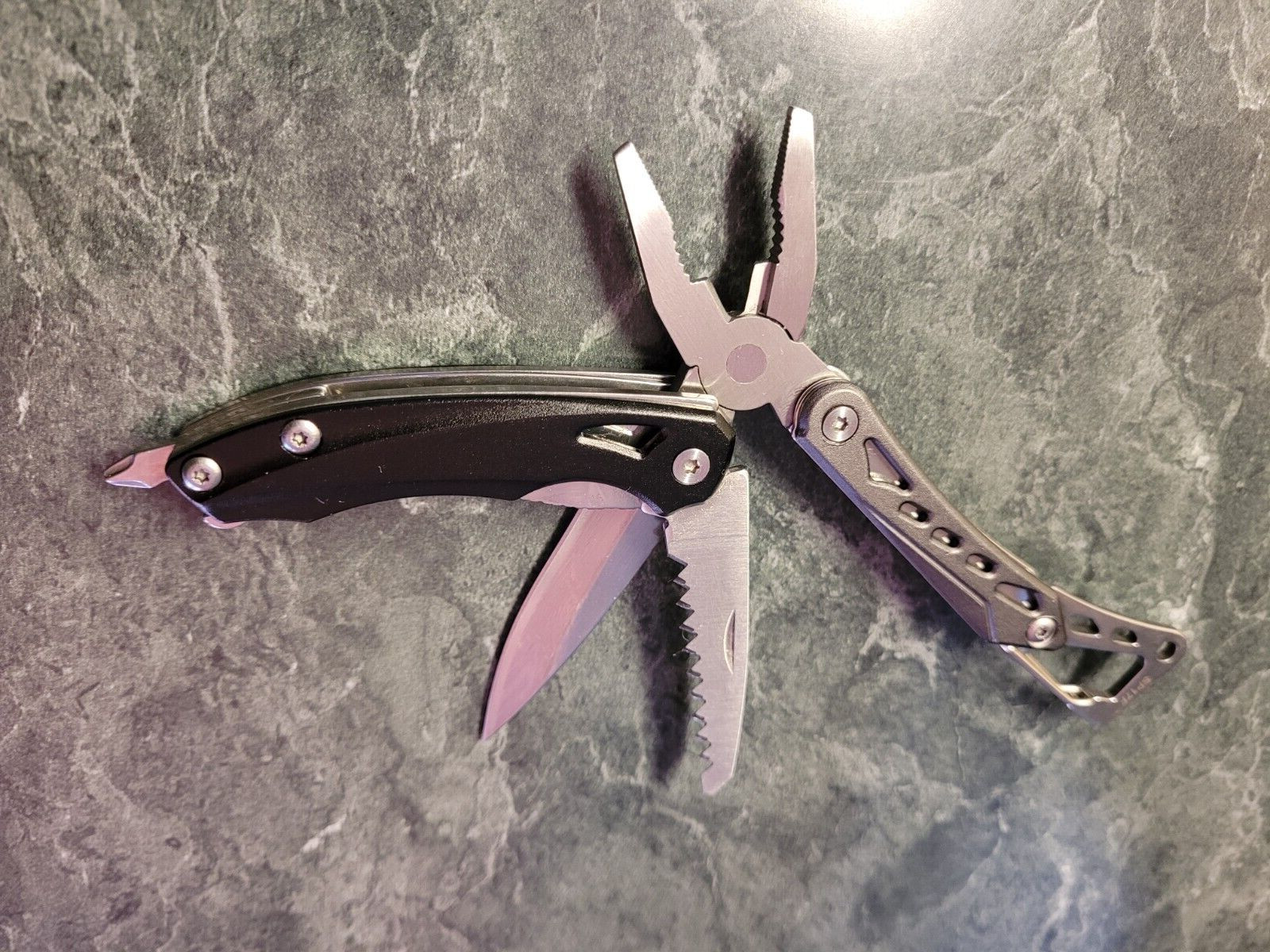 True Utility TU180F Seven Multi-Tool Saw Knife wire cutters Pliers Screwdriver