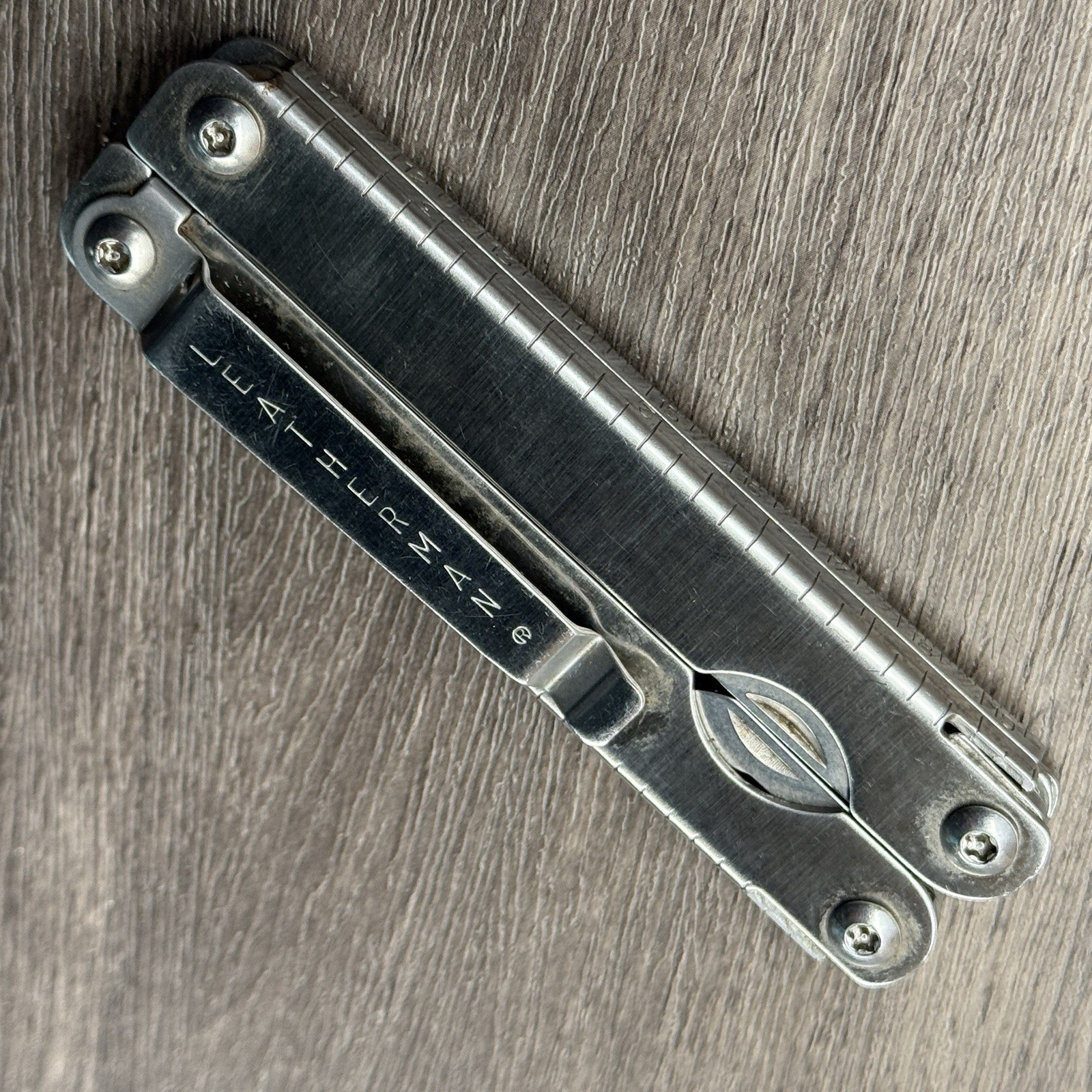 Leatherman Sideclip multitool. Lightly used. Late Run: shiny factory polished