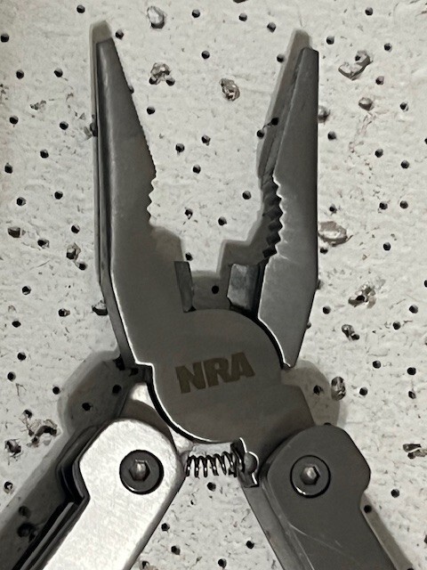 NRA Multi-Tool 4.5” Pliers ,Knives , Can Opener , Ruler and Saw Wood Handle—