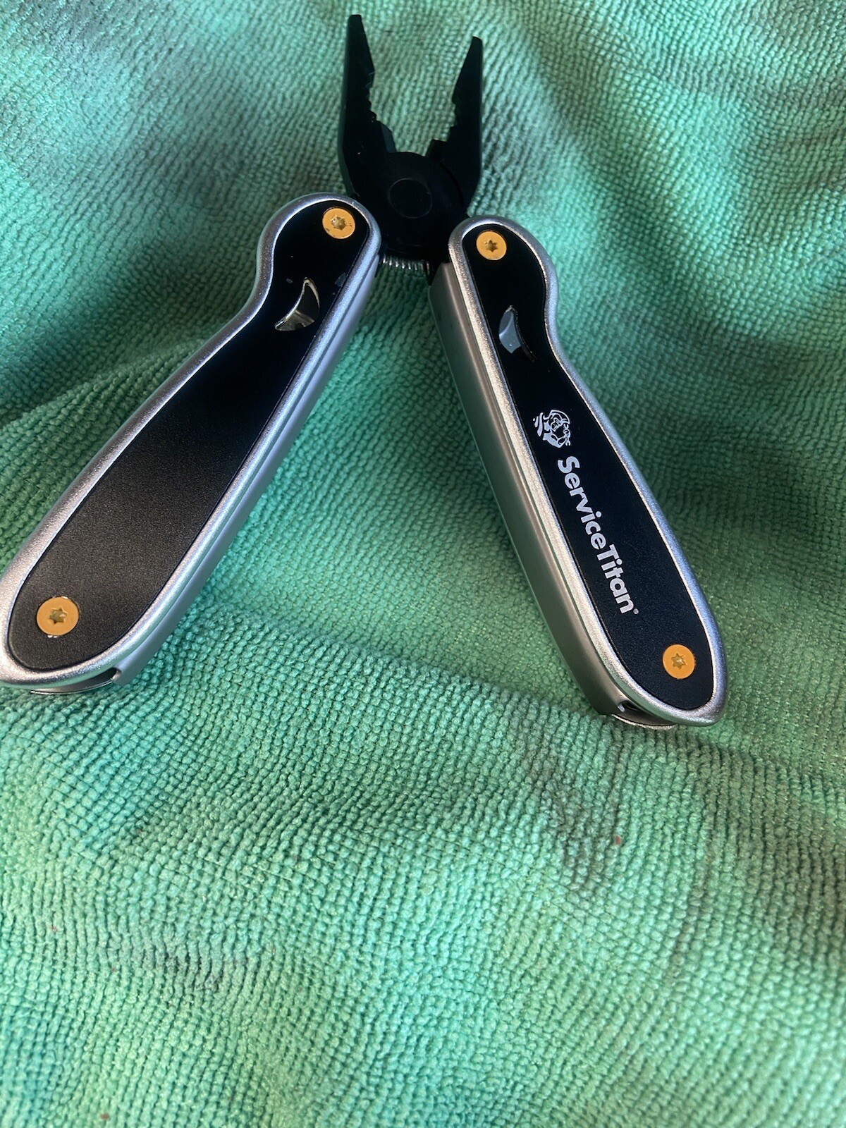Stainless Steel And Black Oxide Multi-Tools Service Titan