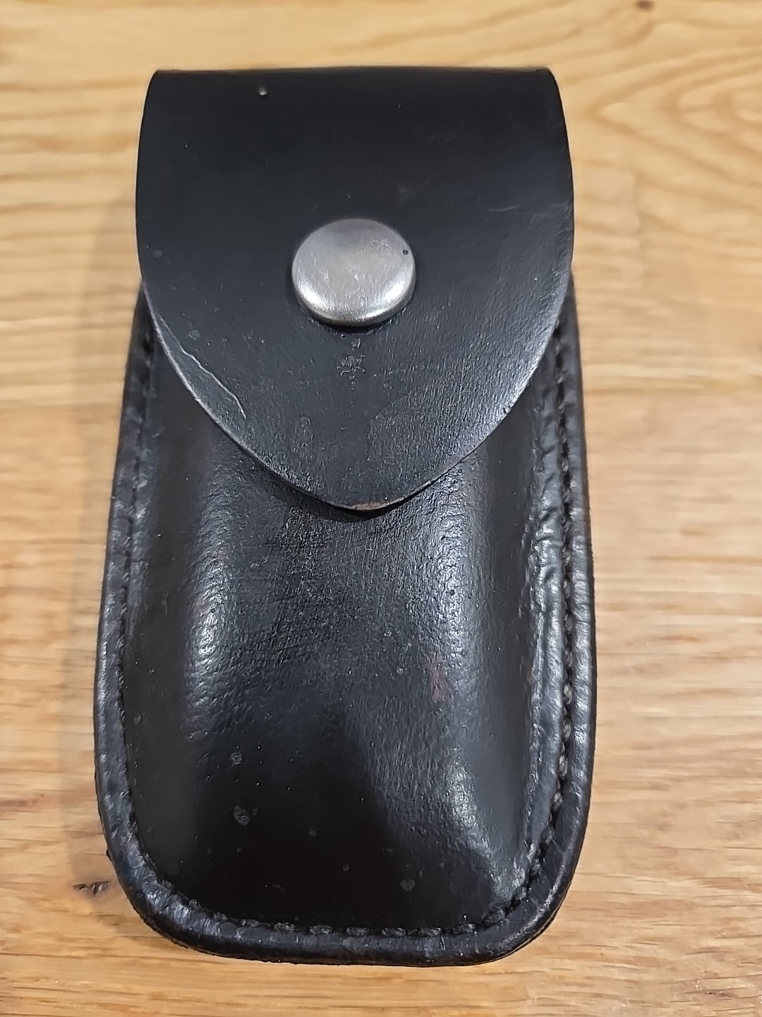 Leatherman Wave Black Dyed leather sheath. Plain flap. Sheath only.