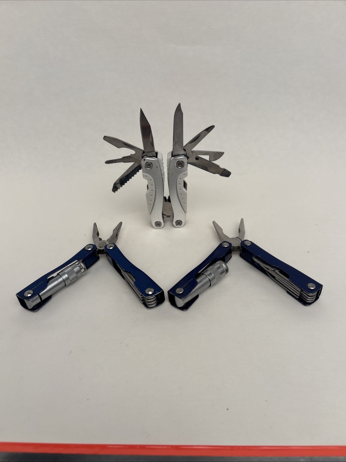 Lot Of 4 Different Function Multi-Tools Winchester Nail Clipper & Wood Grain