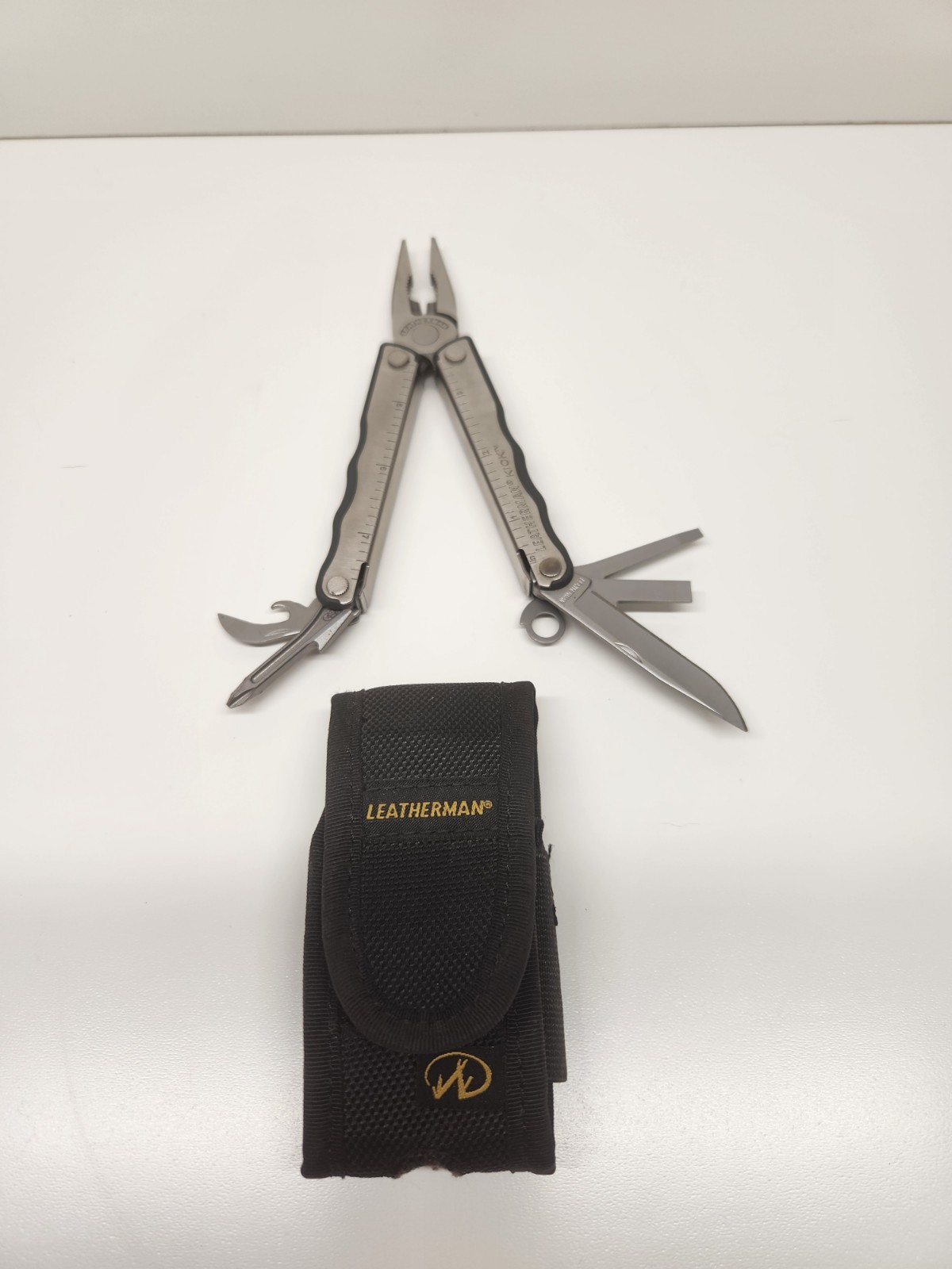 Leatherman Kick Stainless Steel Multi-Tool with Black Sheath Retired Very Good