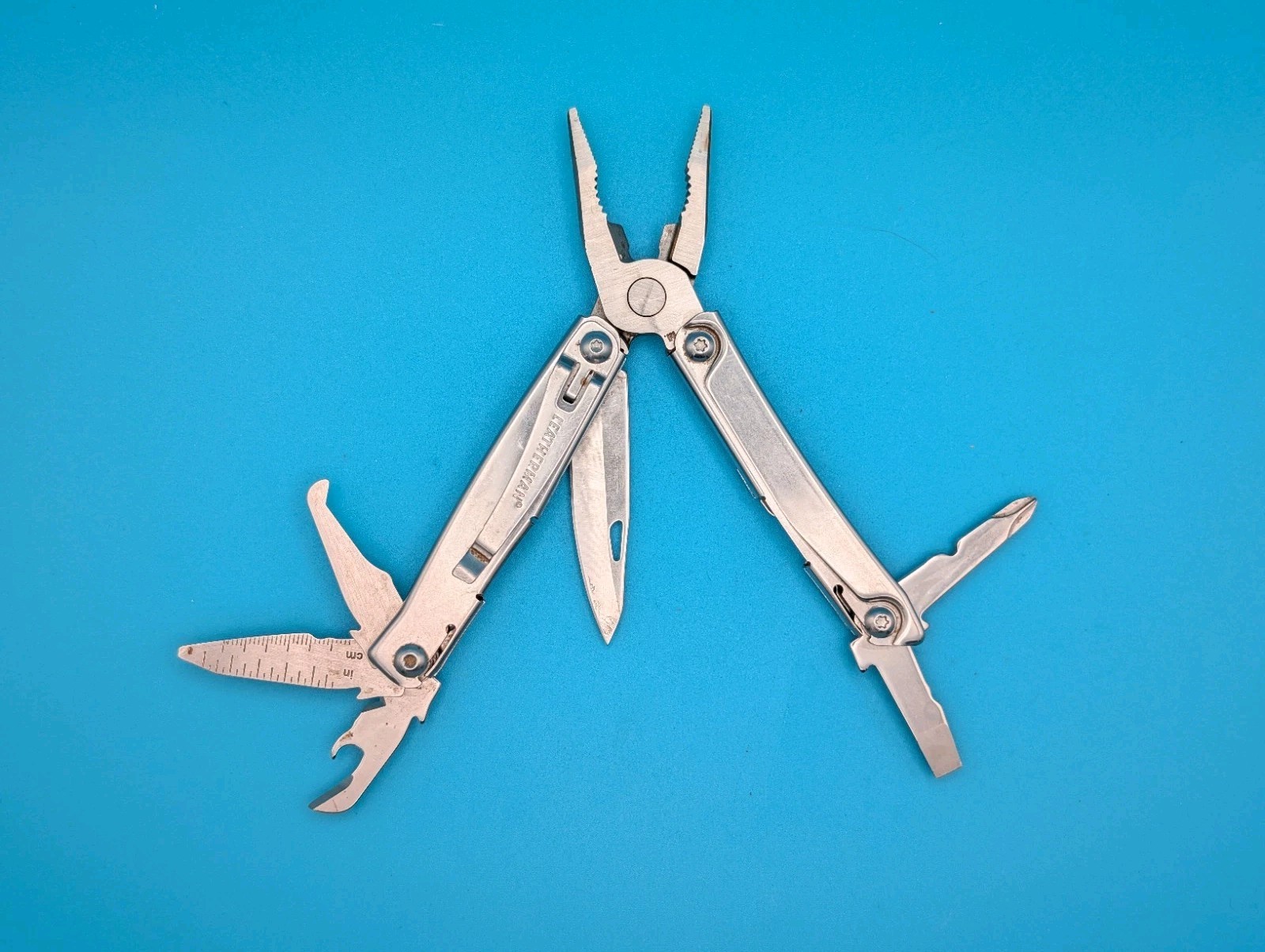 Leatherman Rev 3.8″ Multi-Tool, Stainless! *SOME RUST ON ITEM*