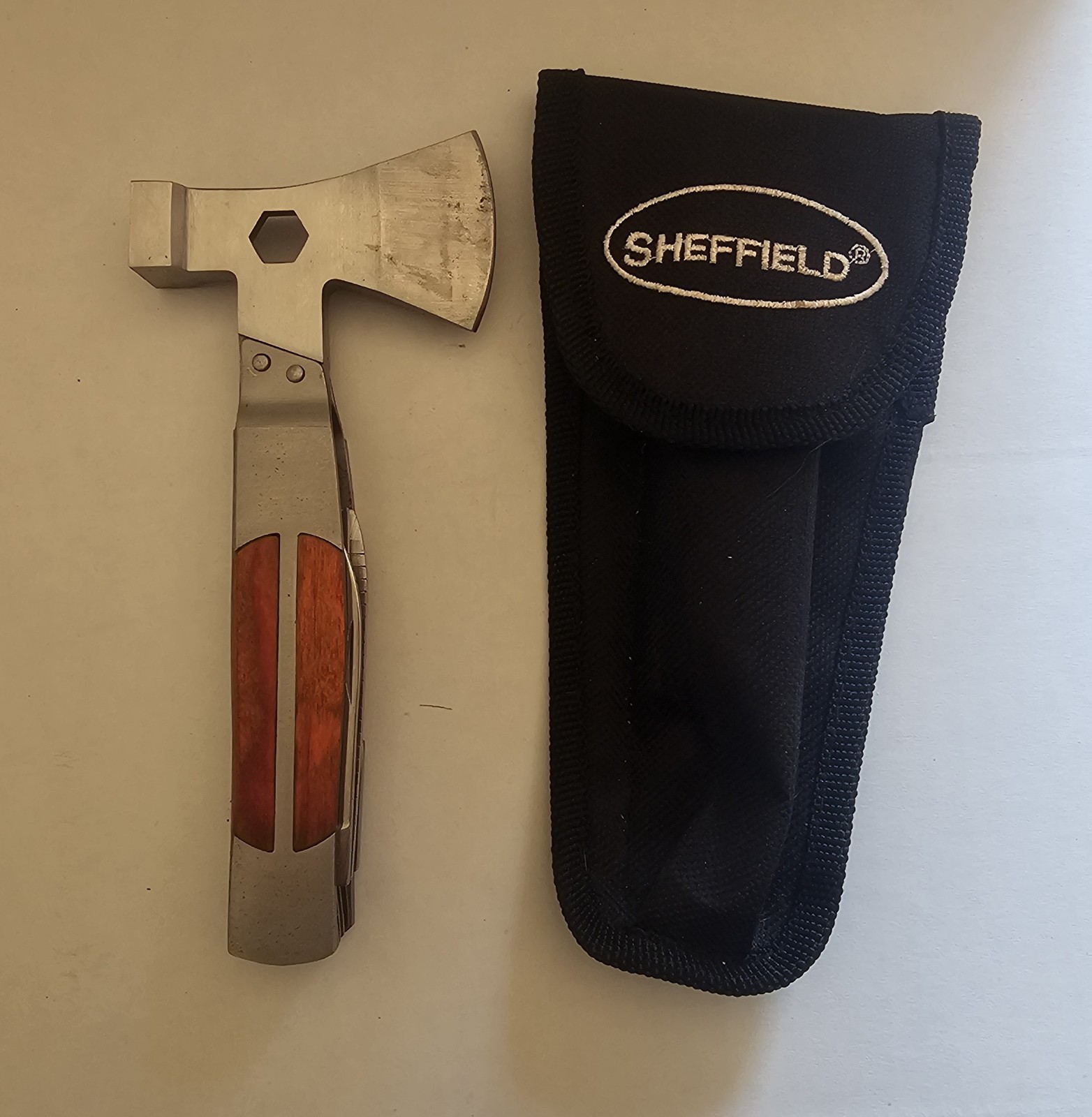 Sheffield 12301 Camper 12-in-1 Multi-Tool featuring a dual axe head and…