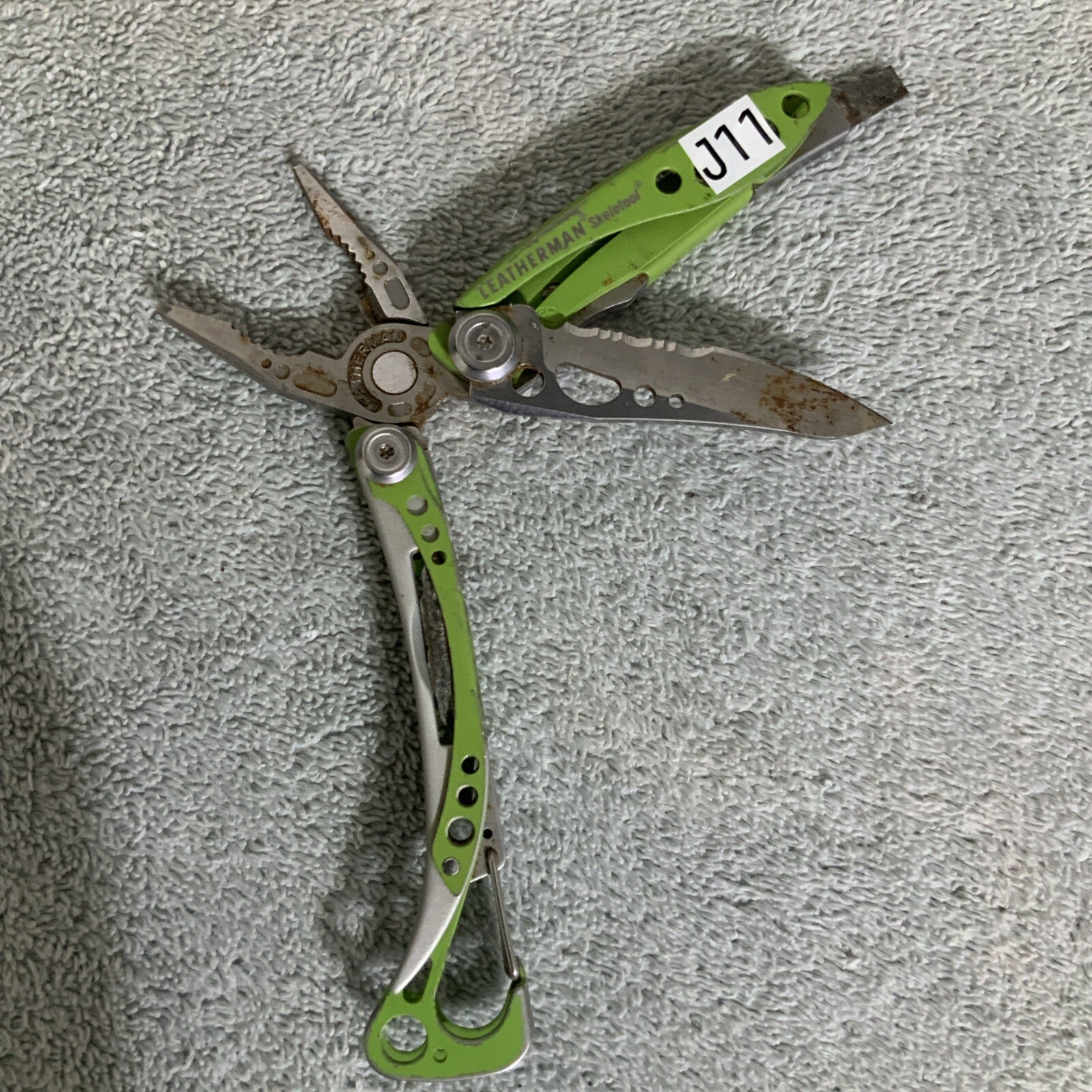 Retired Leatherman “Skeletool Lime Green” Stainless Steel Multi Tool Rust – J11