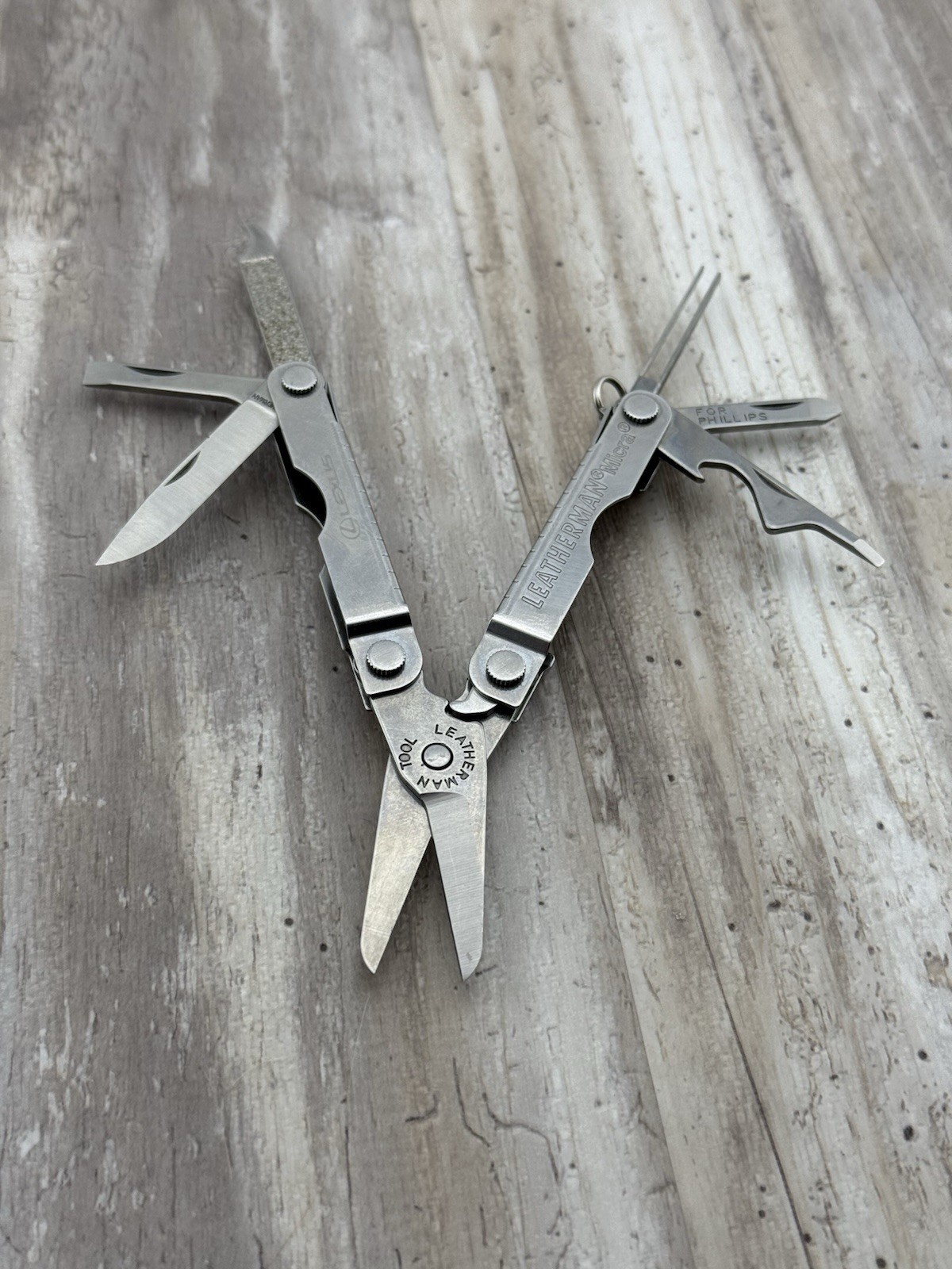 Leatherman Micra Multi-Tool Knife Scissors Key Ring Stainless Lexus logo