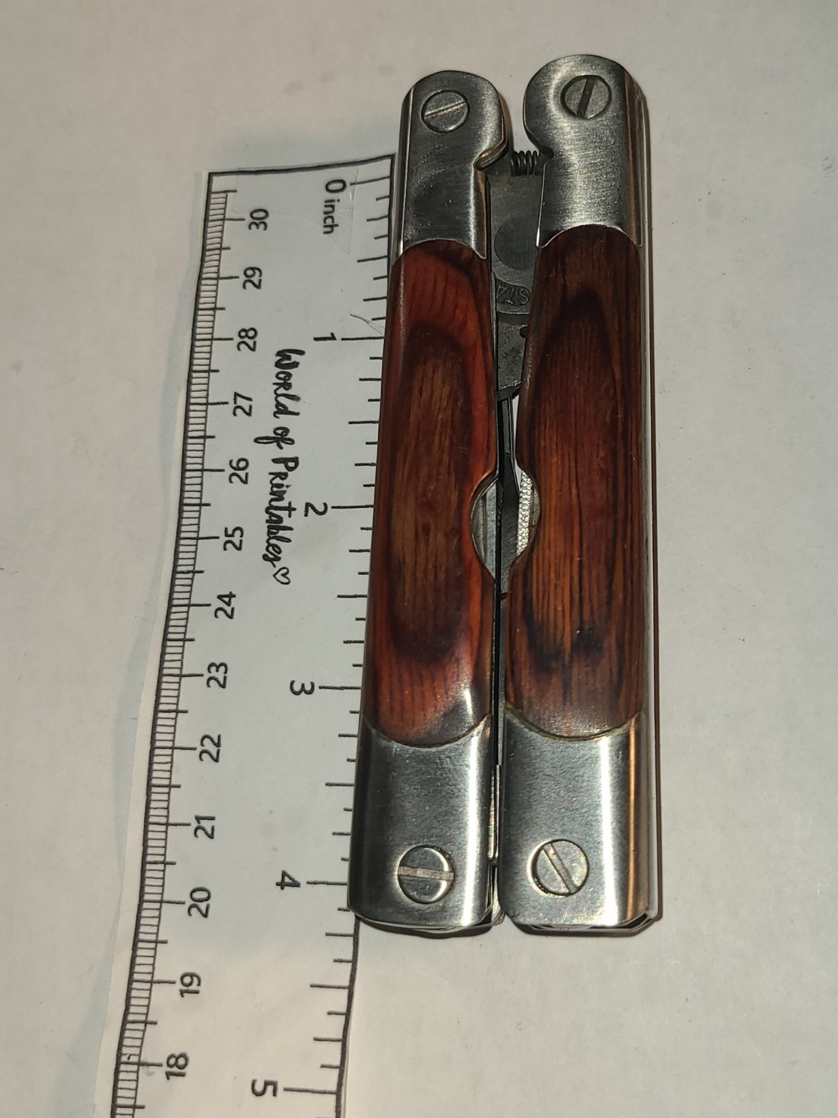 Similar to Leatherman Multi-Tool Sheffield 2CR Wood Grain Handle 12 in 1 minty!