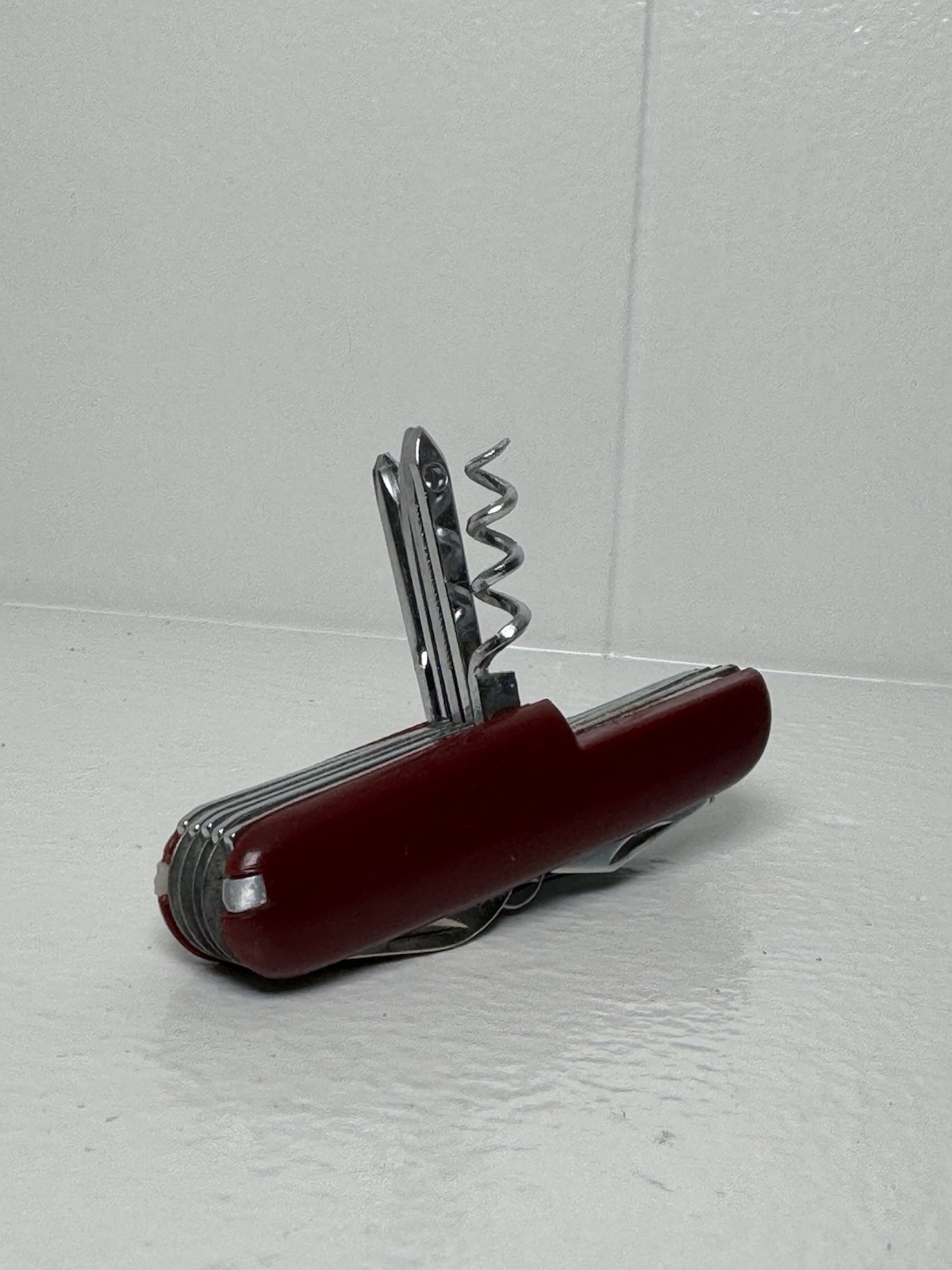 Red Swiss Army Knife With 12 Attachments Including Scissors, Saw, Etc