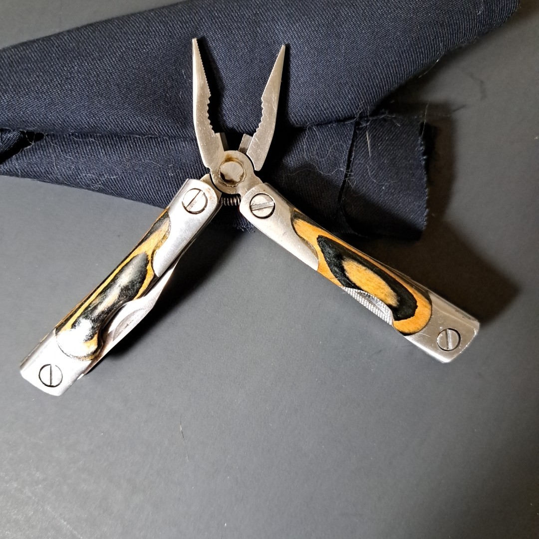 Multi tool With Laminated Wood Handles, Clean