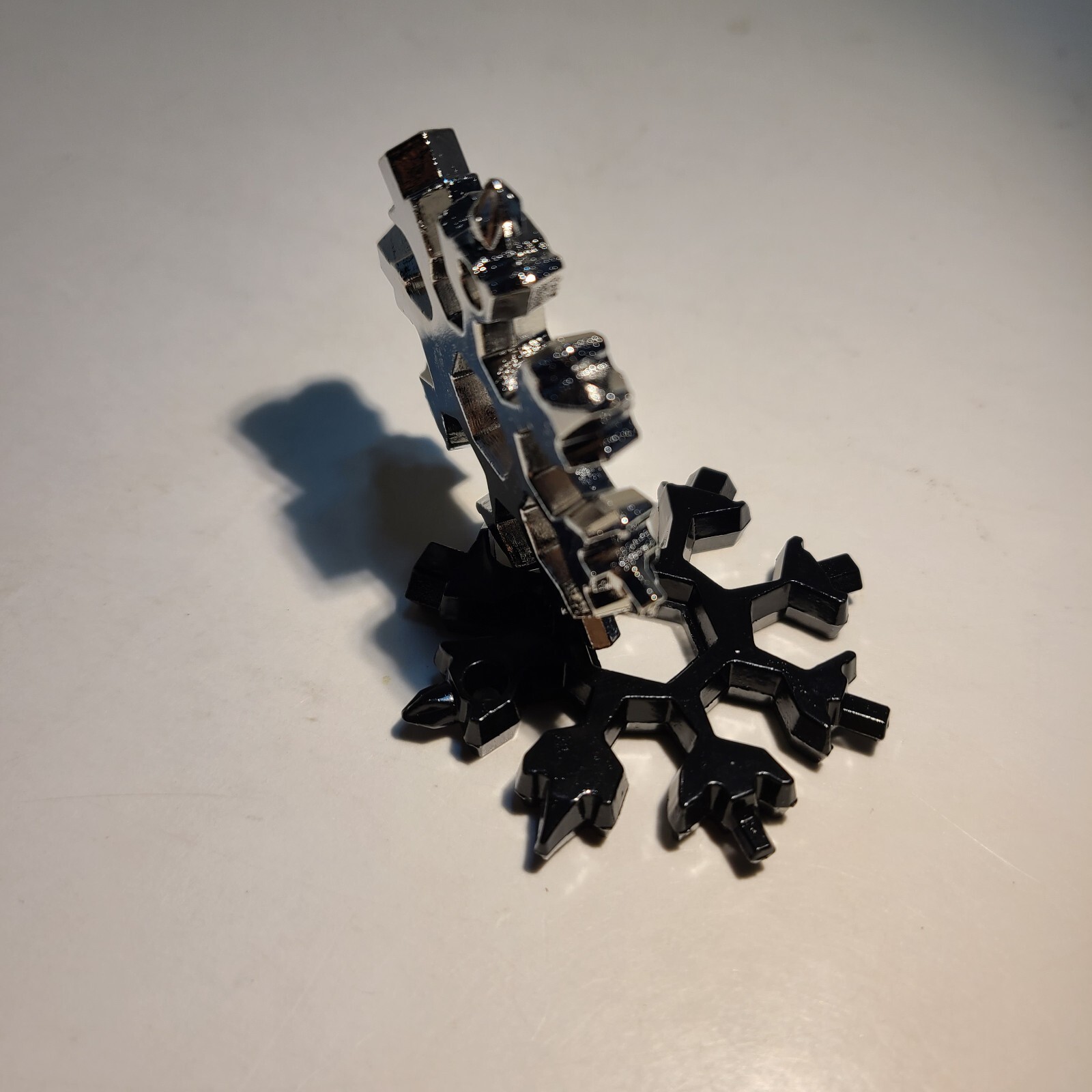 18-in-1 Stainless Steel Snowflake Multi-Repair Tool with Bottle Opener, etc.