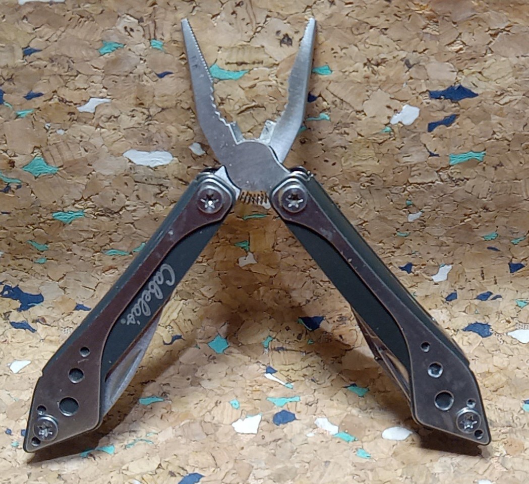 USED SILVER CABELA’S 7 IN 1 MULTI-TOOL VERY GOOD CONDITION