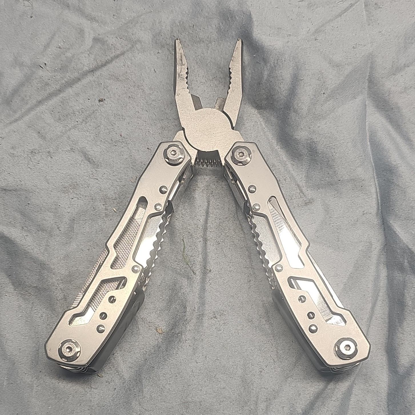 Silver Stainless Steel Multi-Tool with 7 Tools: Plier, Knife, File