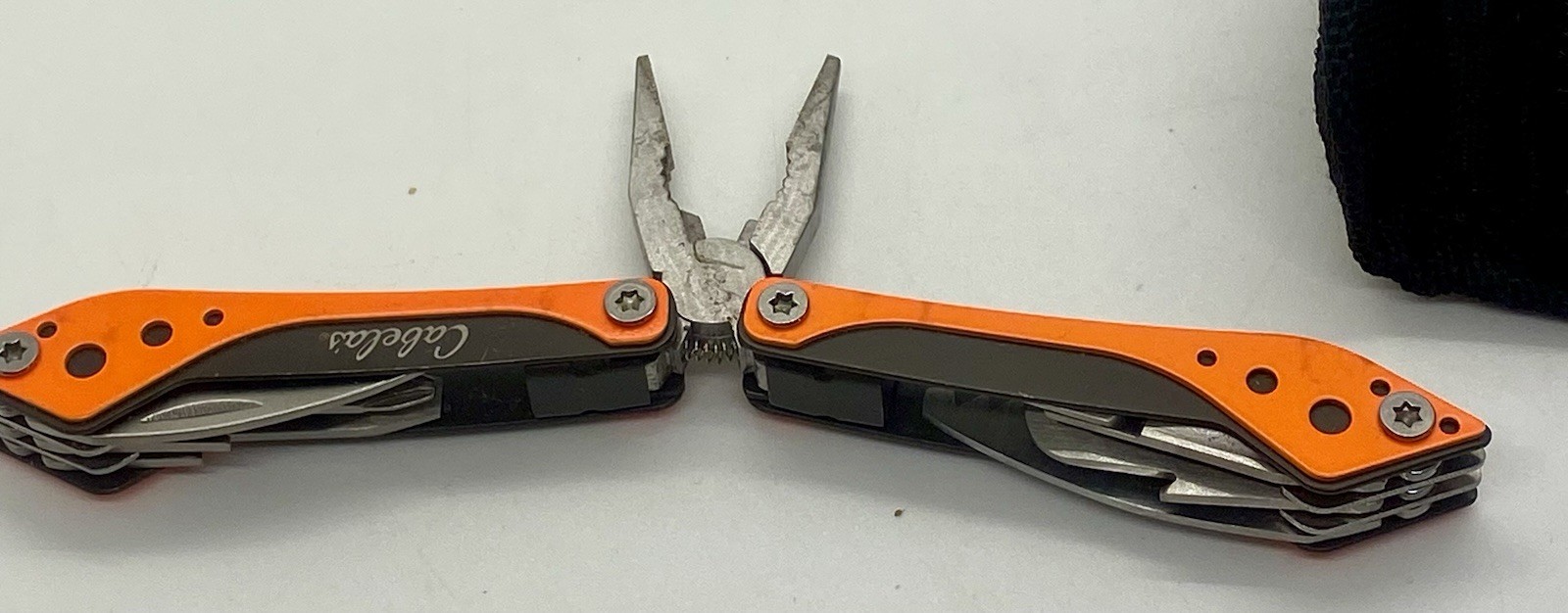 Cabela’s Multi-Tool 7 Tools in 1 Orange Knife Pliers Stainless Steel Black Case