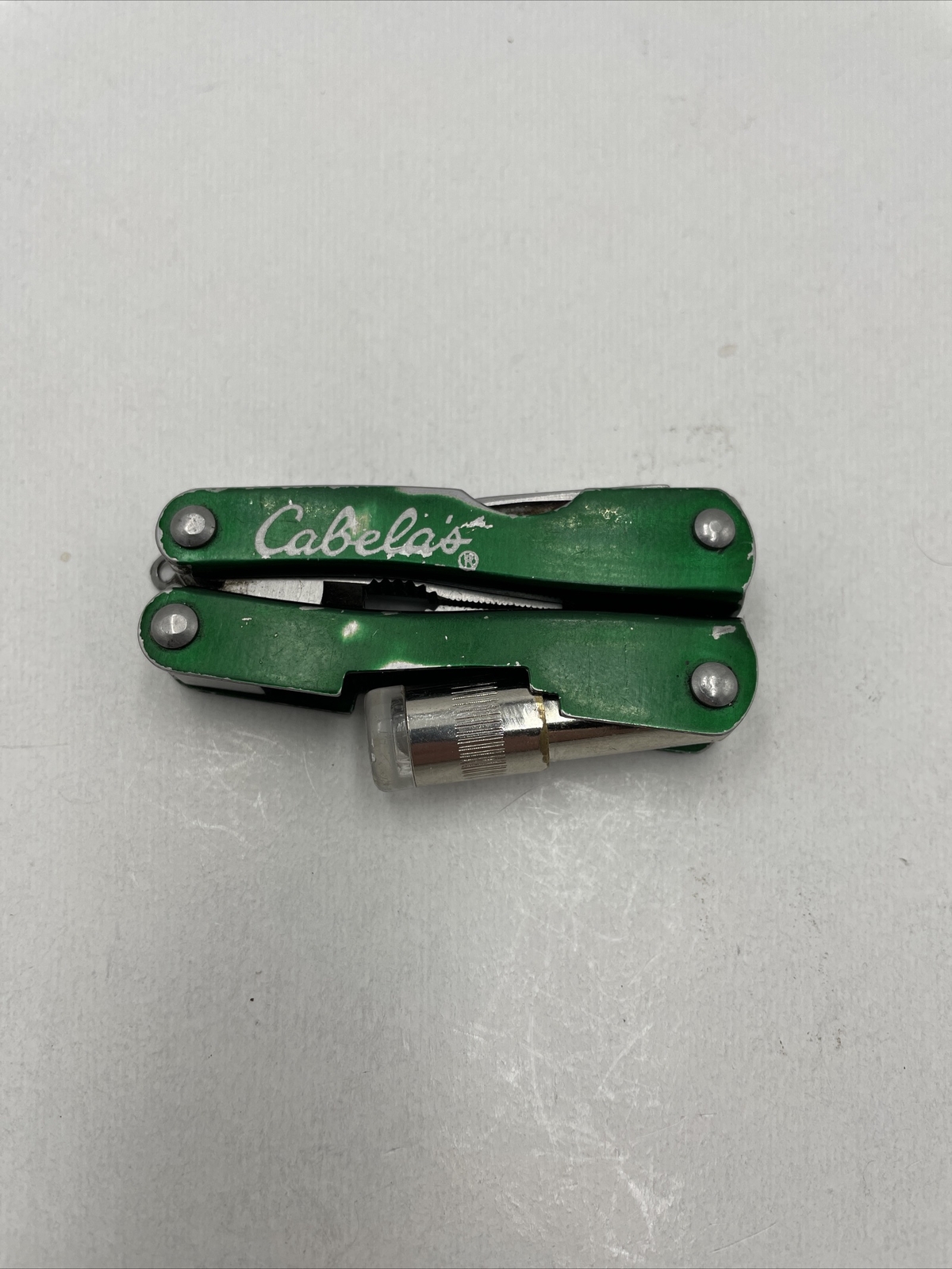 Cabela’s Mini Multi-tool w/ LED flashlight green