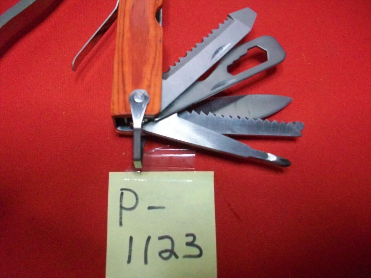 COLLECTIBLE SURVIVAL TOOL W/ MULTIPLE TOOLS BUILT-IN GREAT FOR CAMPING & HIKING