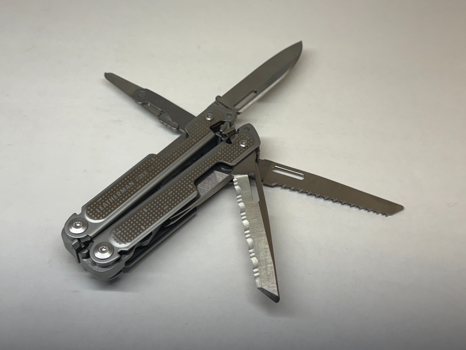 Leatherman FREE P4 Multitool with Nylon Sheath. New in Open Box. Discontinued.