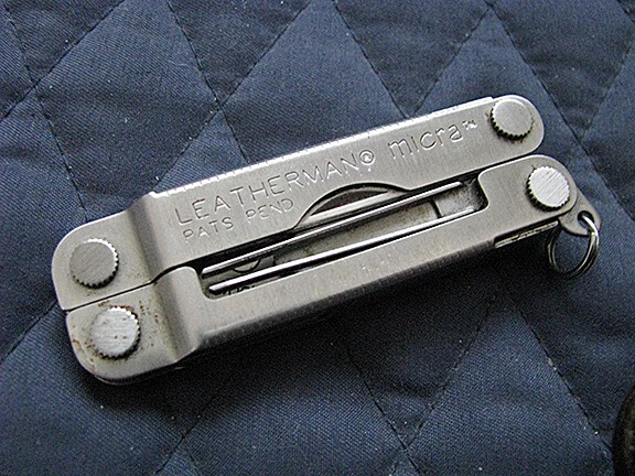 Letherman Multi mini Tool with case.