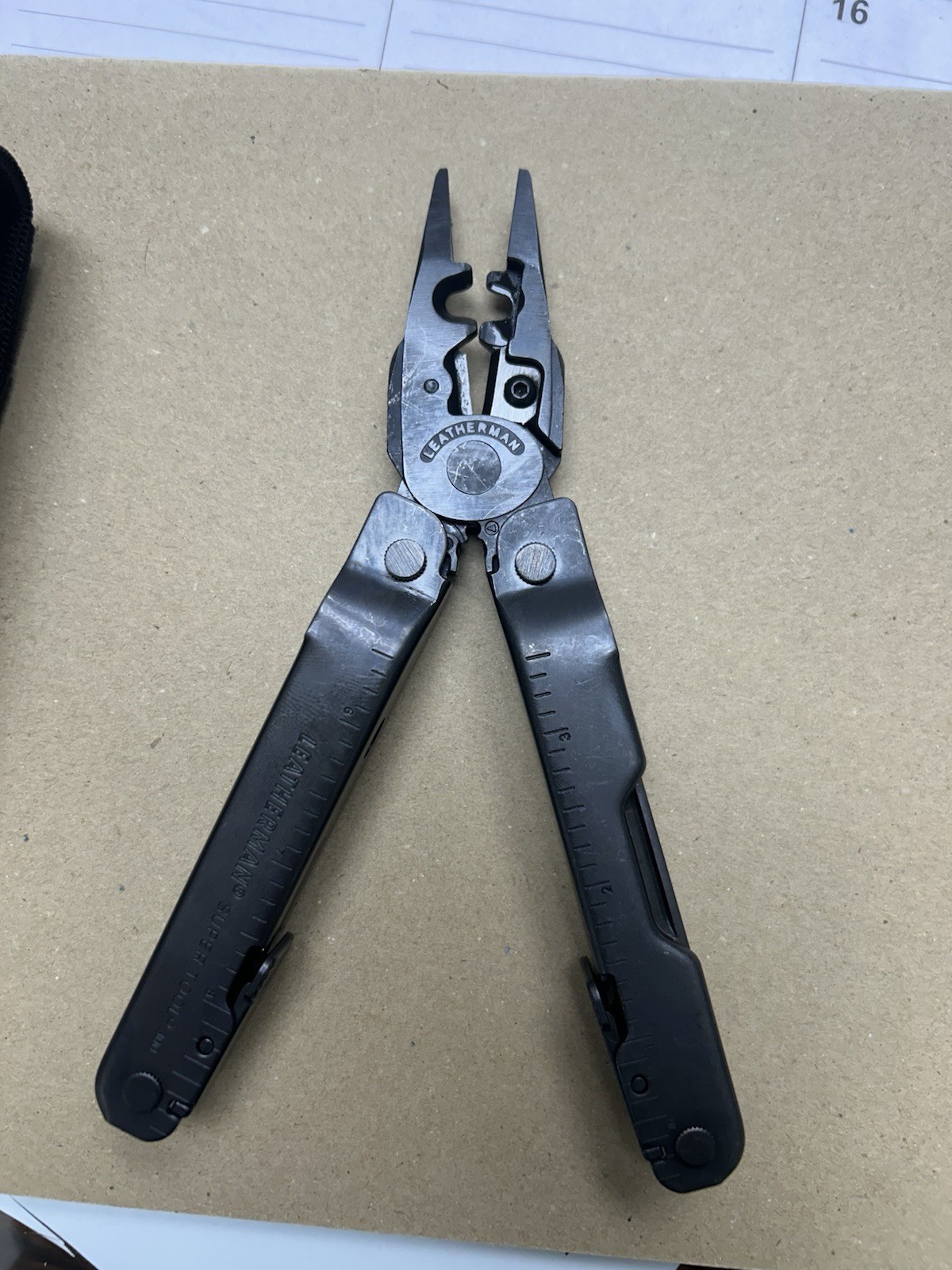 Leatherman Super Tool 300 Multitool Black Oxide w/Leatherman Molle Sheath