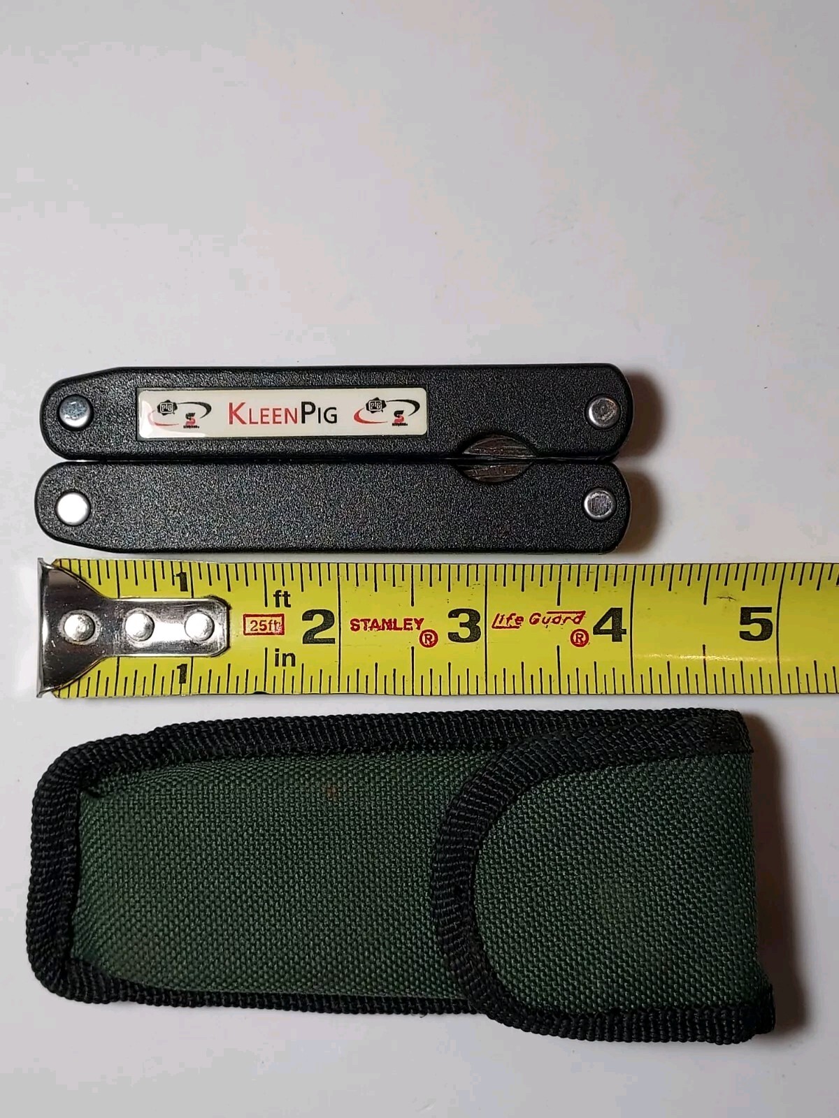 Barlow Multi Tool advertising Kleen Pig with sheath