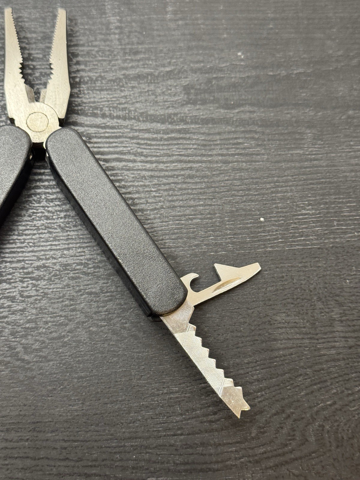 The Home Depot 14-in-1 Multi-Tool, Multi-Plyers, screwdriver, knife comb