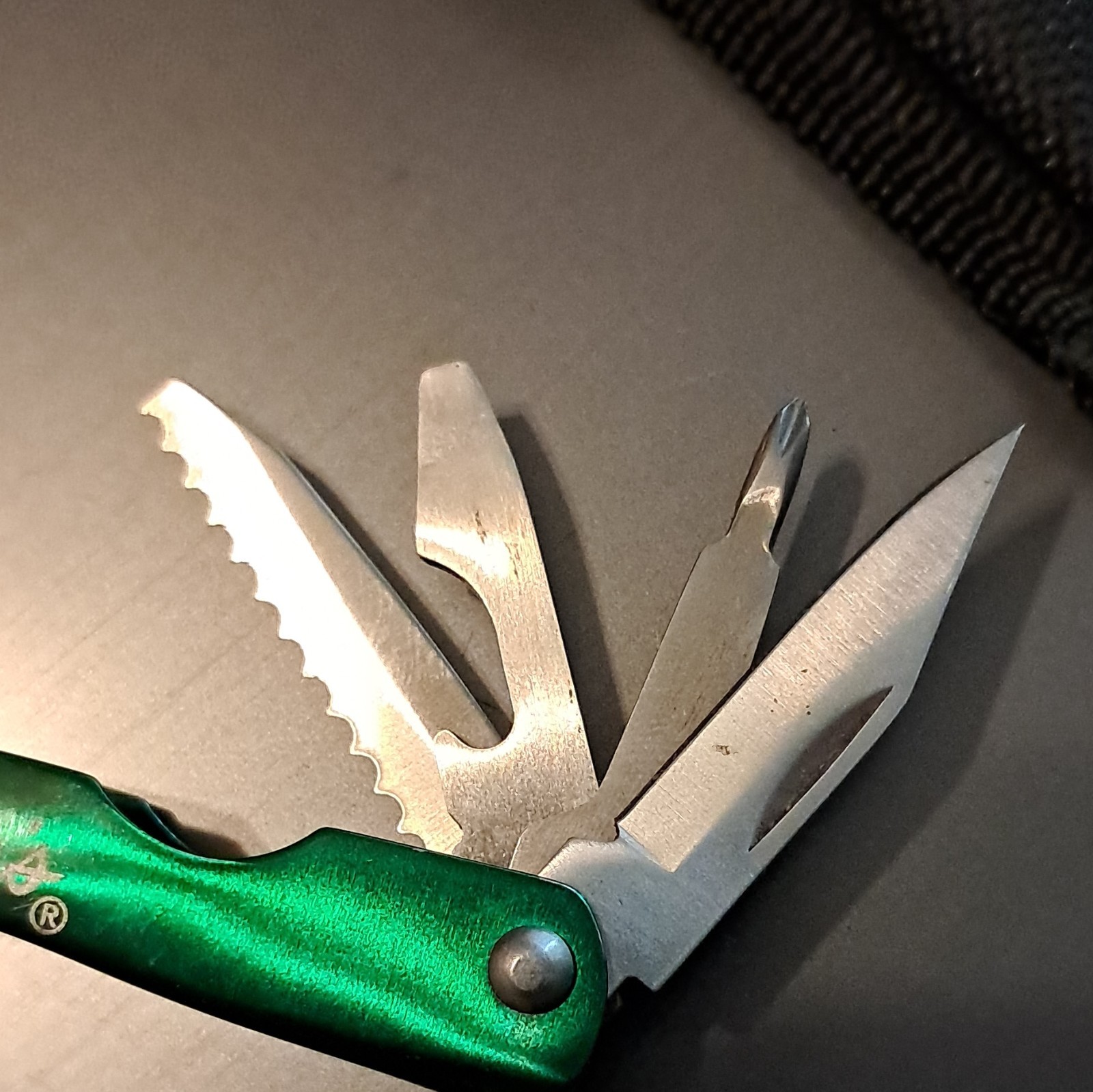 Cabela’s Green/Silver 6-in-1 Multi-Tool Pliers, 2.25″ SS Blade w/ Sheath