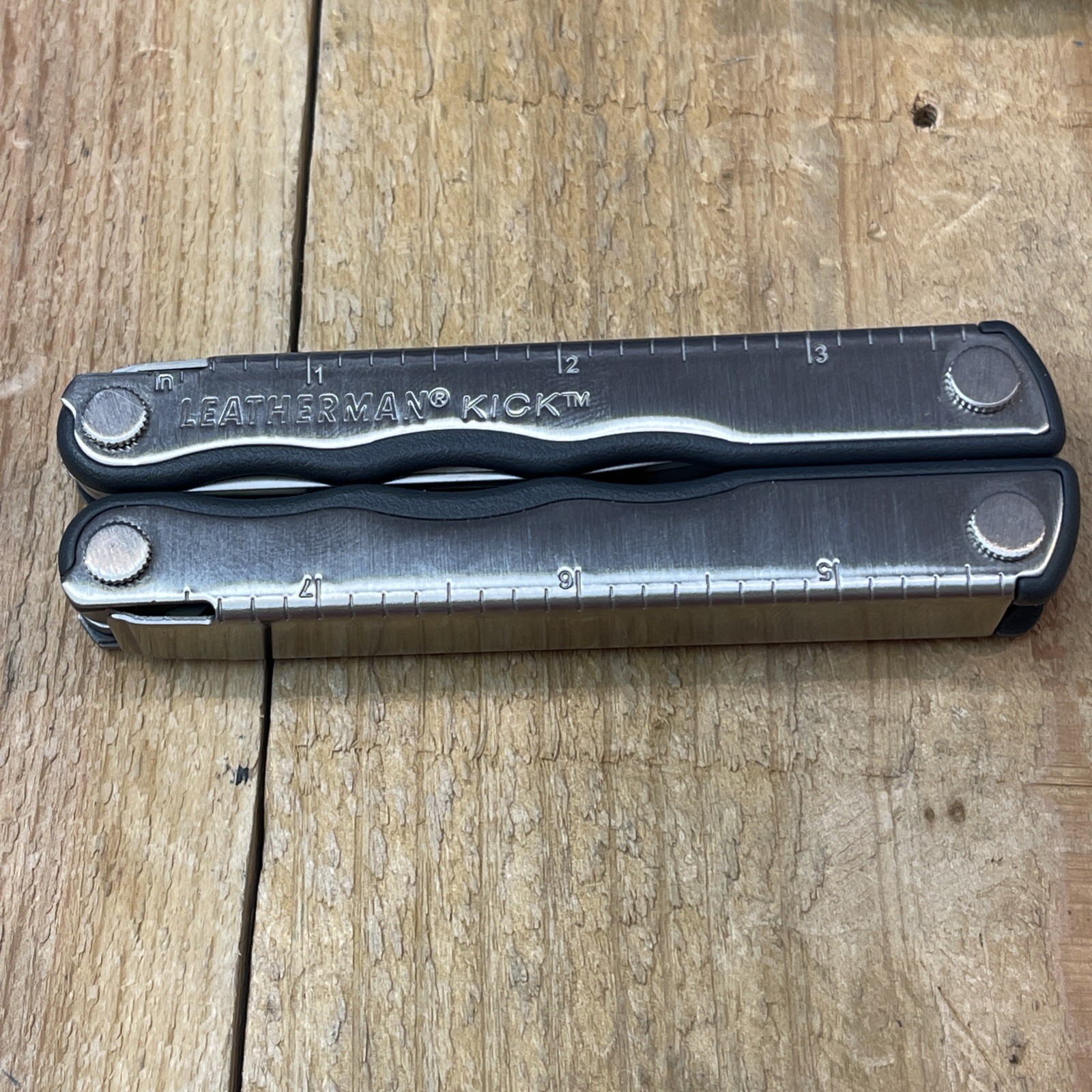 Leatherman KICK multitool. New, with vintage Leather Snap belt sheath Mint Knife