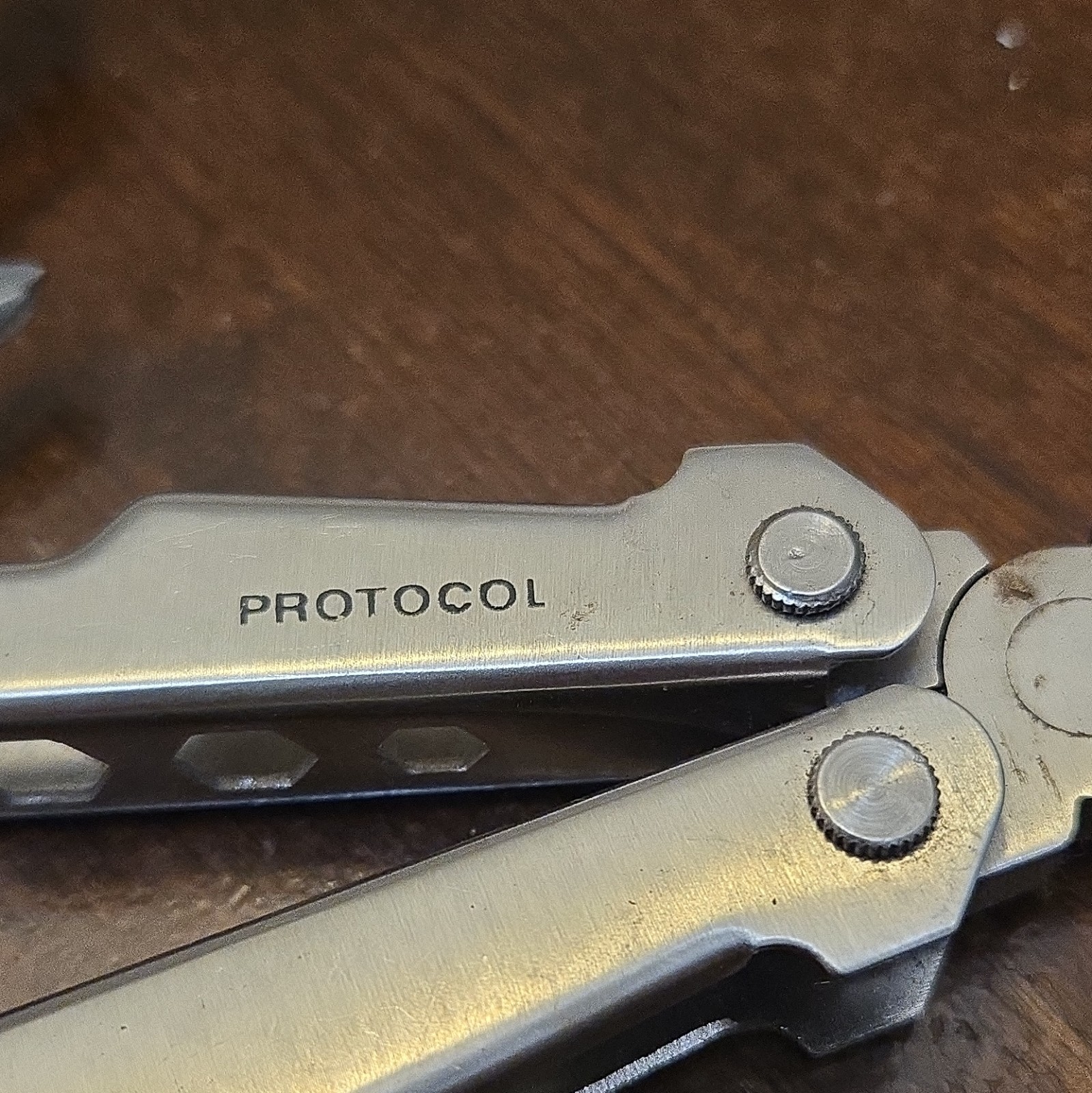 Protocol Stainless Steel 10-in-1 Multi-Tool Pliers Knife Saw Screwdrivers Silver