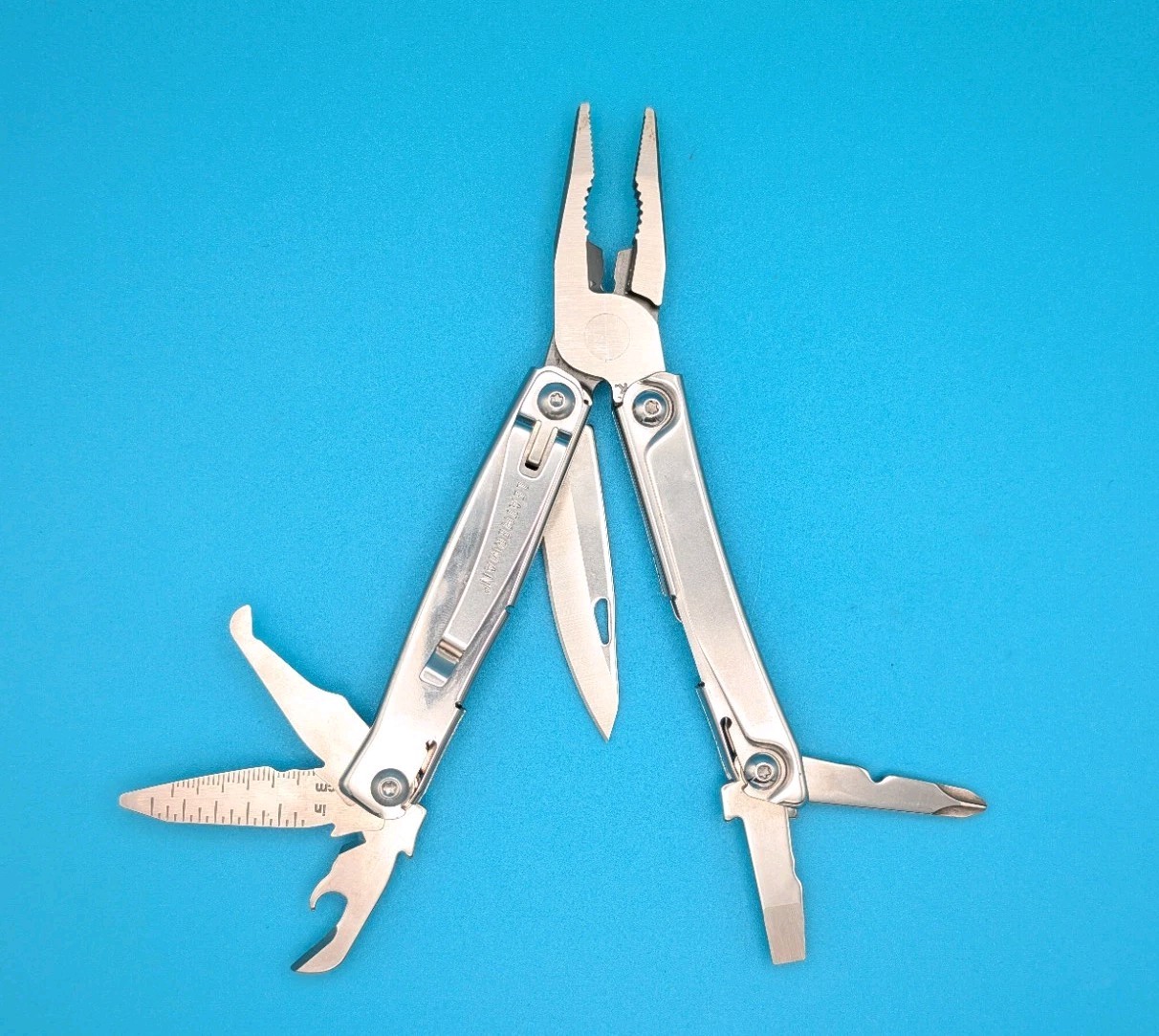 Leatherman Rev 3.8″ Multi-Tool, Stainless! With Sheath!