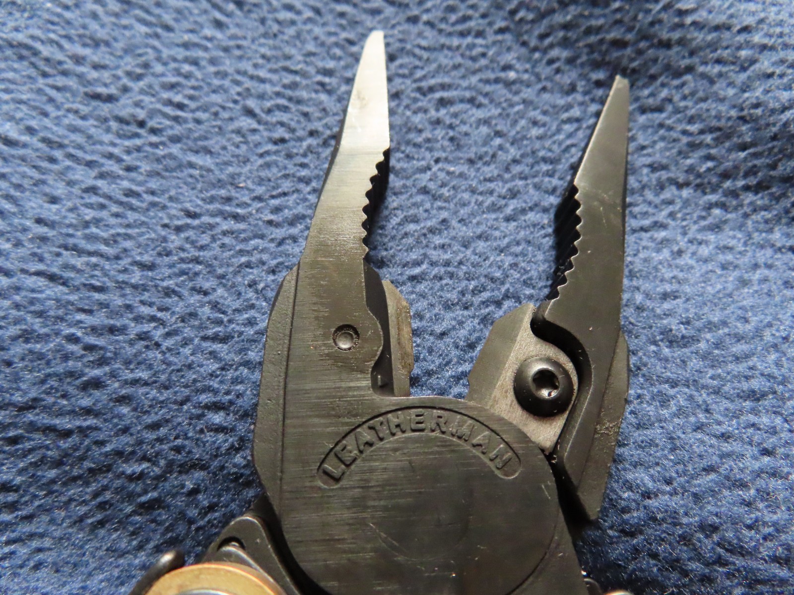 Leatherman MUT Black Titanium Clip multi tool brown sheath. 10/2011