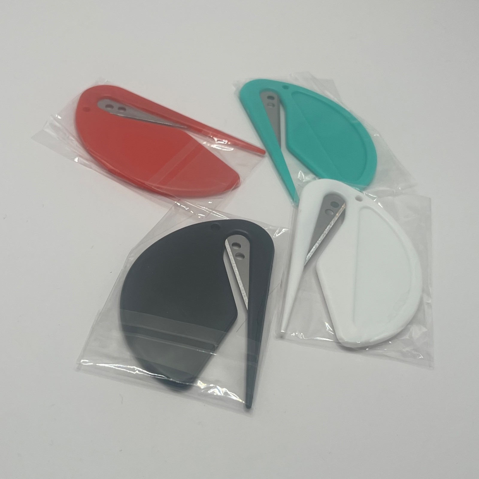 Lot of 12 Multi Color – Teal, White, Red, Black – Seatbelt Cutter Saftey Tools