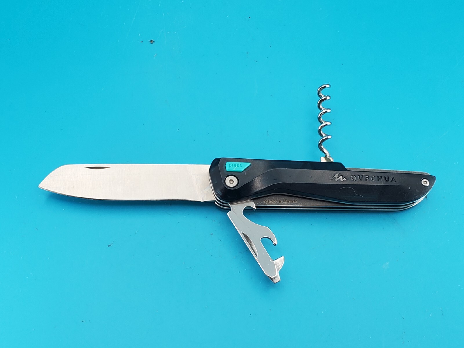 QUECHUA CLAP FOLDING KNIFE NAVAJA MULTITOOL! TRANSLUCENT BLUE!