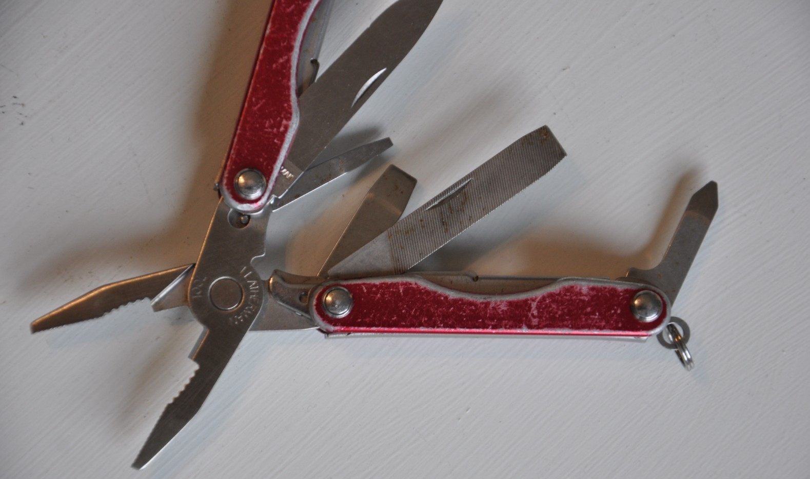 RED Leatherman Retired Squirt P4 Multi-Tool Key Ring READ Full Description