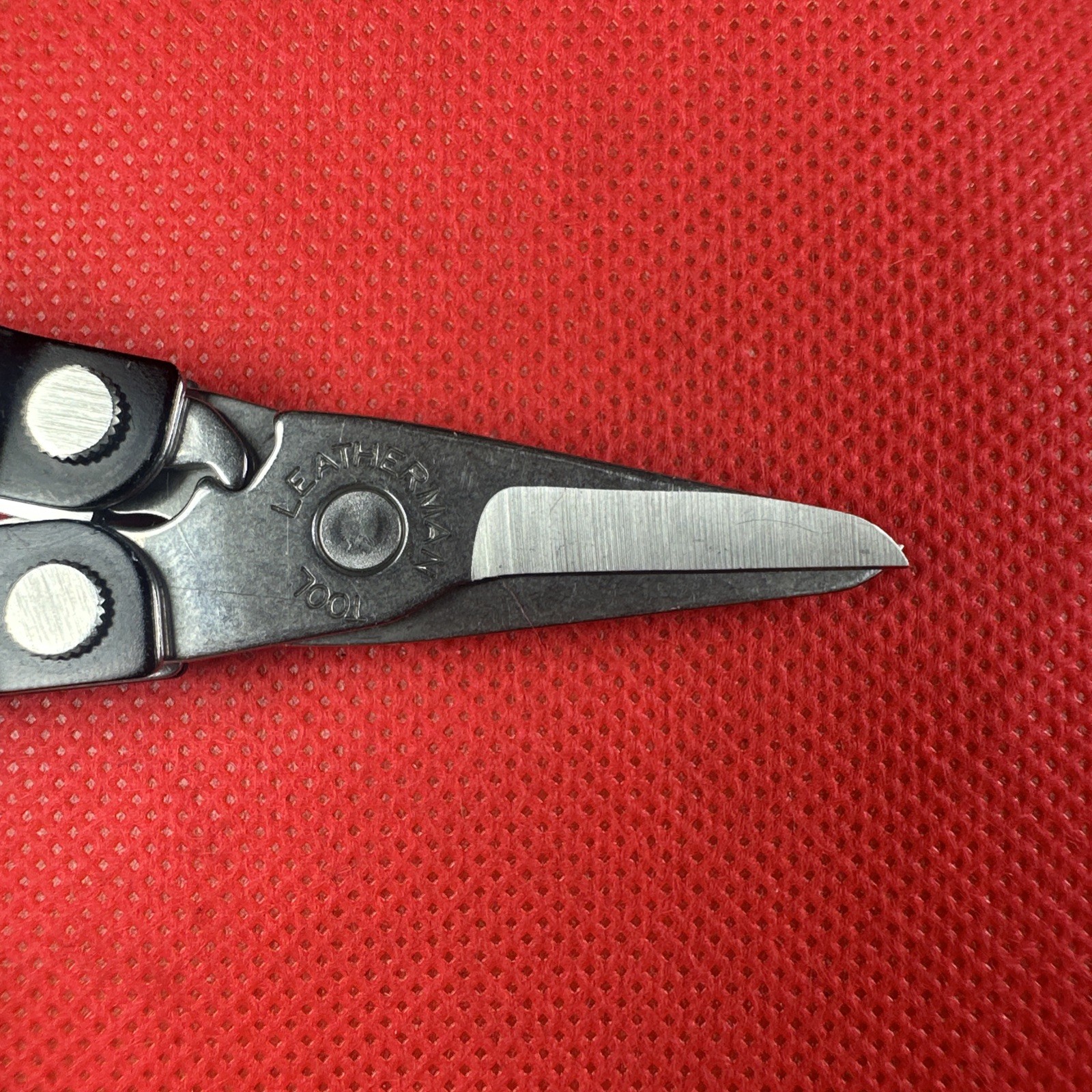 Nice Black Leatherman Micra Multi-Tool, scissor, knife, tweezer, screwdriver