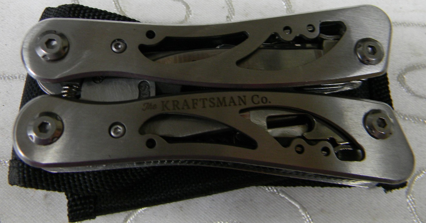 THE KRAFTSMAN COMPANY STAINLESS STEEL 12 IN 1 MULTI TOOL WITH NYLON SHEATH