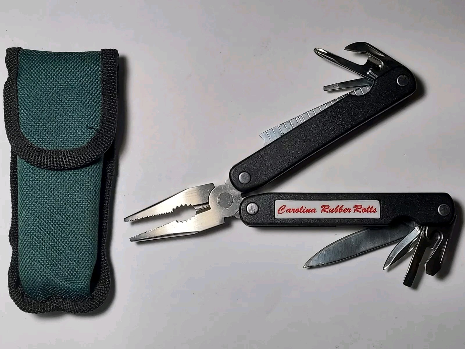 Pliers Multi Tool advertising Carolina Rubber Rolls with nylon pouch