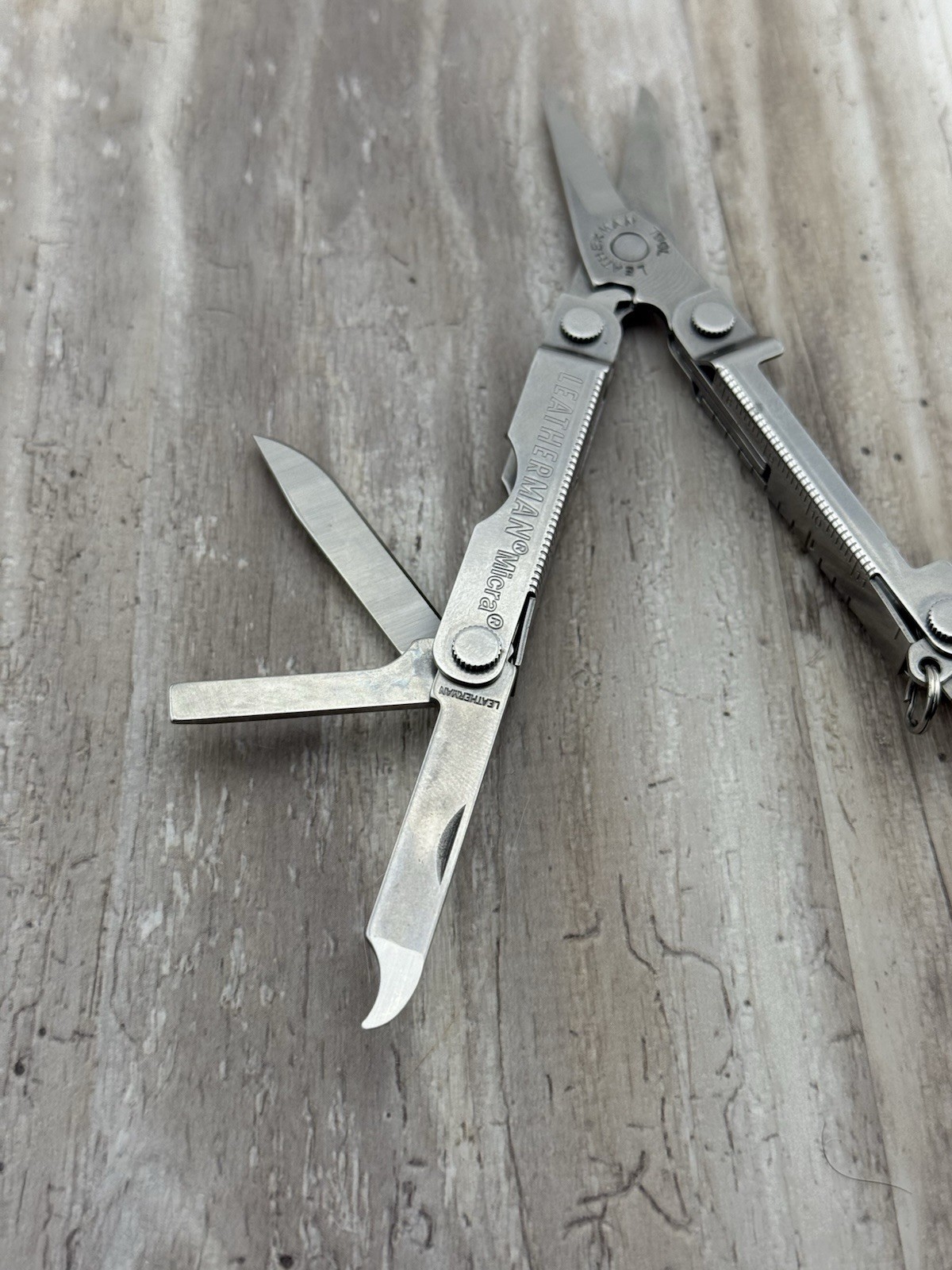 Leatherman Micra Multi-Tool Knife Scissors Key Ring Stainless Lexus logo