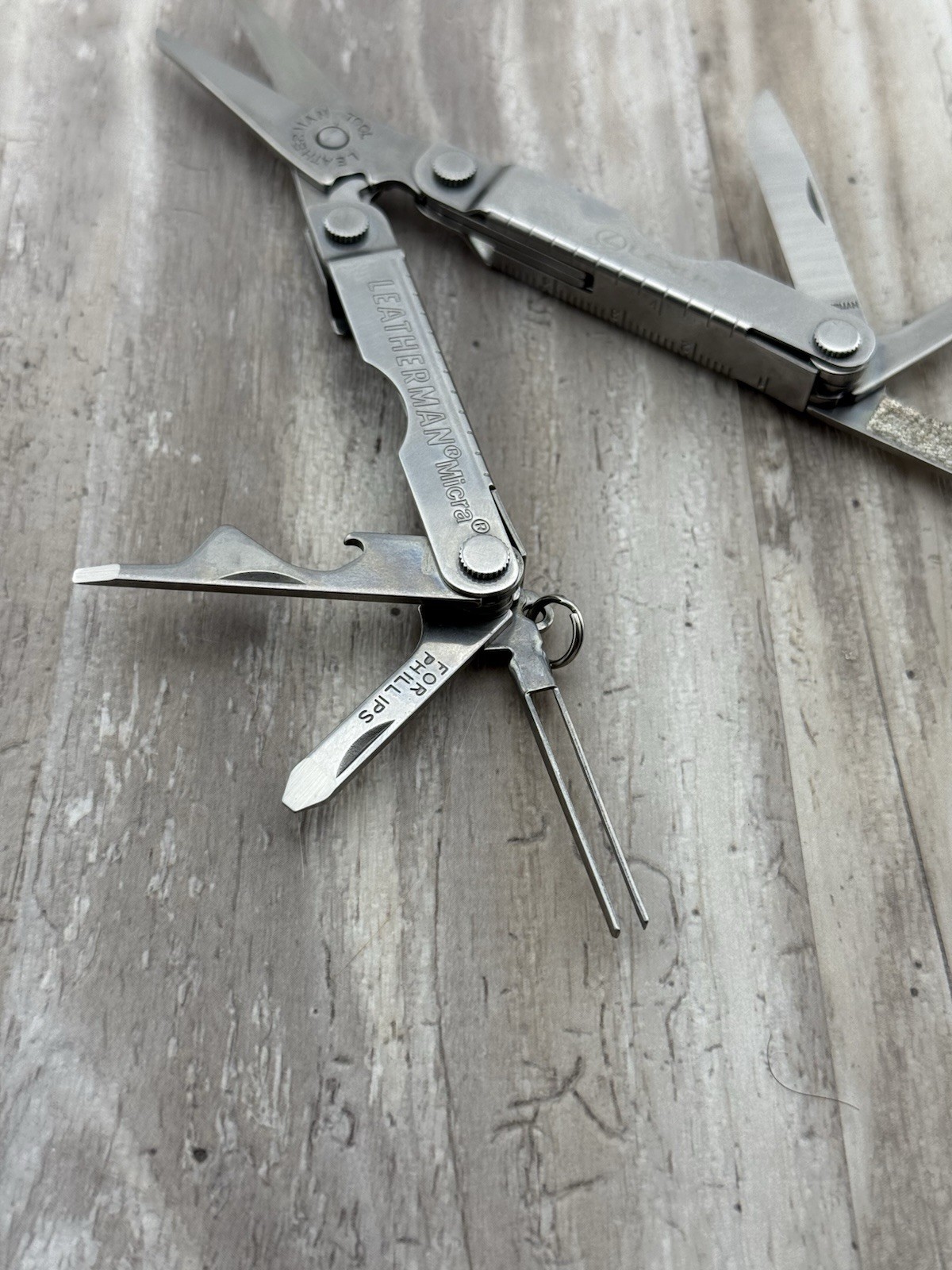 Leatherman Micra Multi-Tool Knife Scissors Key Ring Stainless Lexus logo