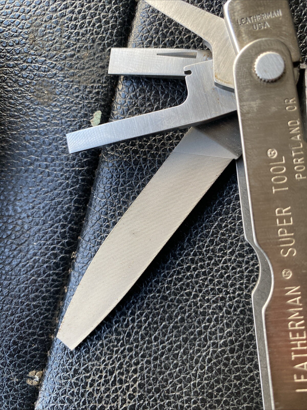 Multi-tool With Pocket Clip. Leatherman 832127 Rev Stainless Steel