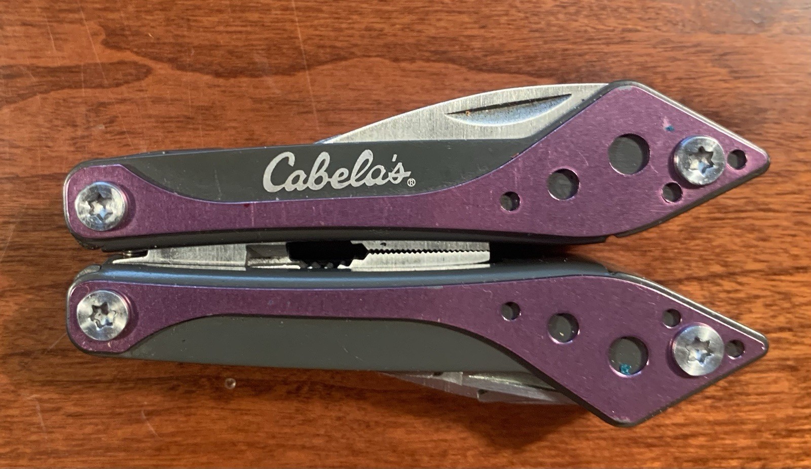 Cabela’s 8-Tool Multi-Tool with Spring Open Pliers, Scissors, Saw Purple