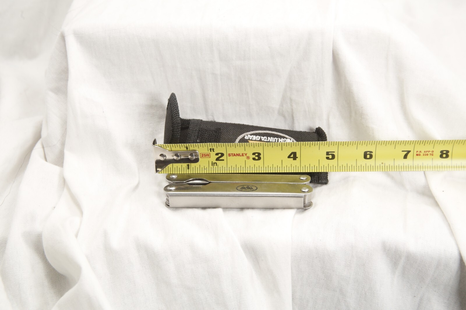 High Uinta Gear, multitool and canvas case, sliver 4.5 inches x 1.75 inches