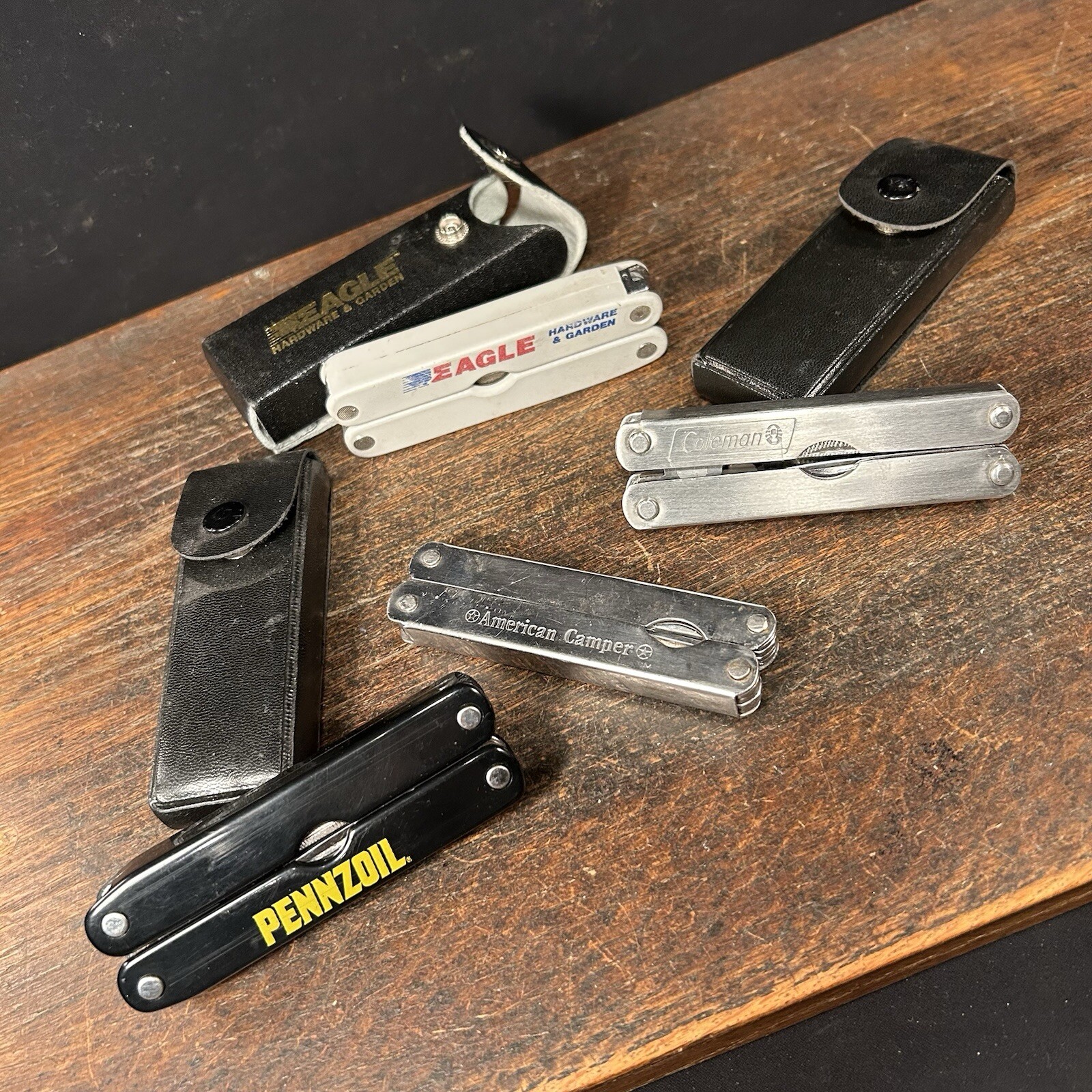 Vintage Multi Tool Lot (4) Knife Pennzoil Eagle Coleman American Camper