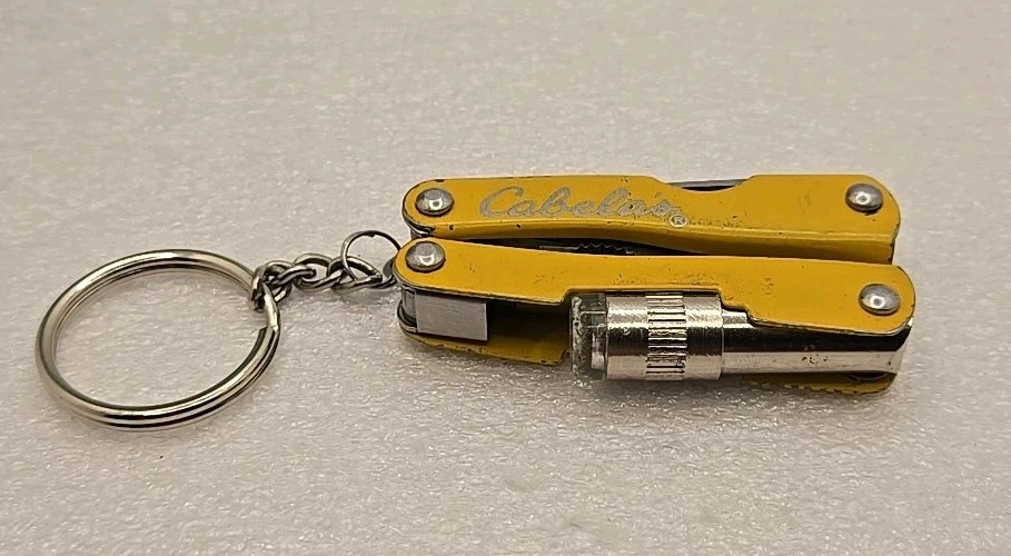 Cabelas Pocket Multi-Tool Flashlight Serrated Knife Can Opener Pliers Keychain