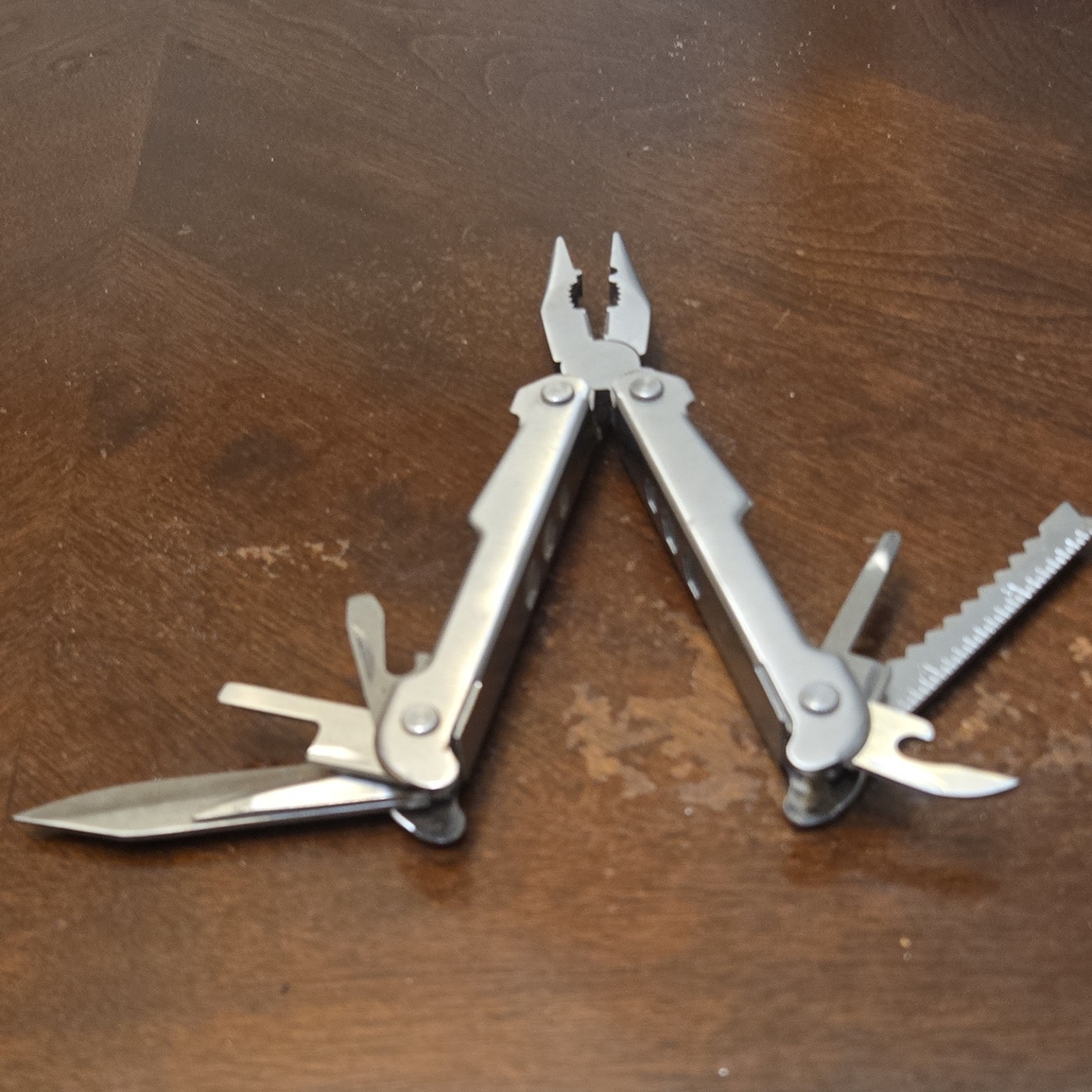 Protocol Stainless Steel 10-in-1 Multi-Tool Pliers Knife Saw Screwdrivers Silver