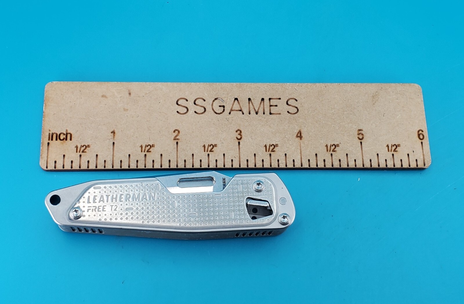 Leatherman FREE T2 Pocket Knife Multi-tool! RAINTREE PARTNERS